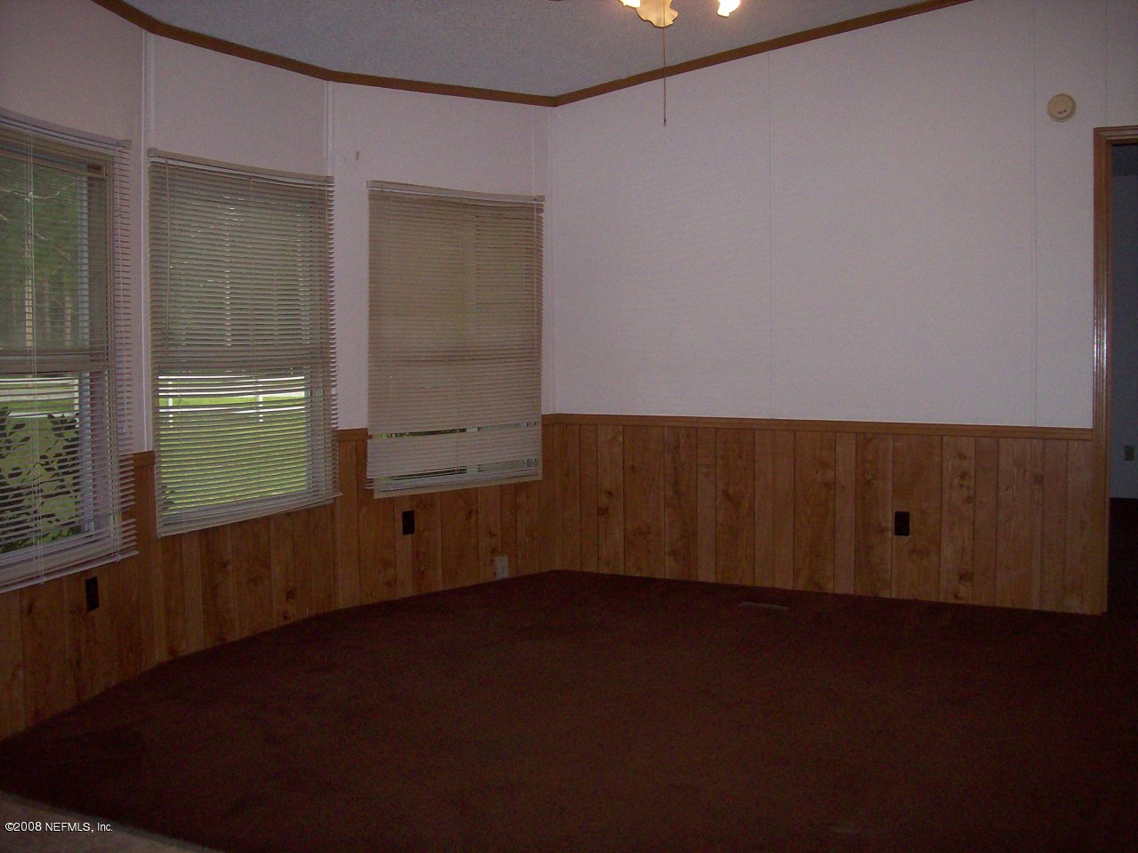 7733 Mud Lake Road Macclenny, FL 32063 - Photo 4 of 9 LIVNG ROOM 2ND VIEW