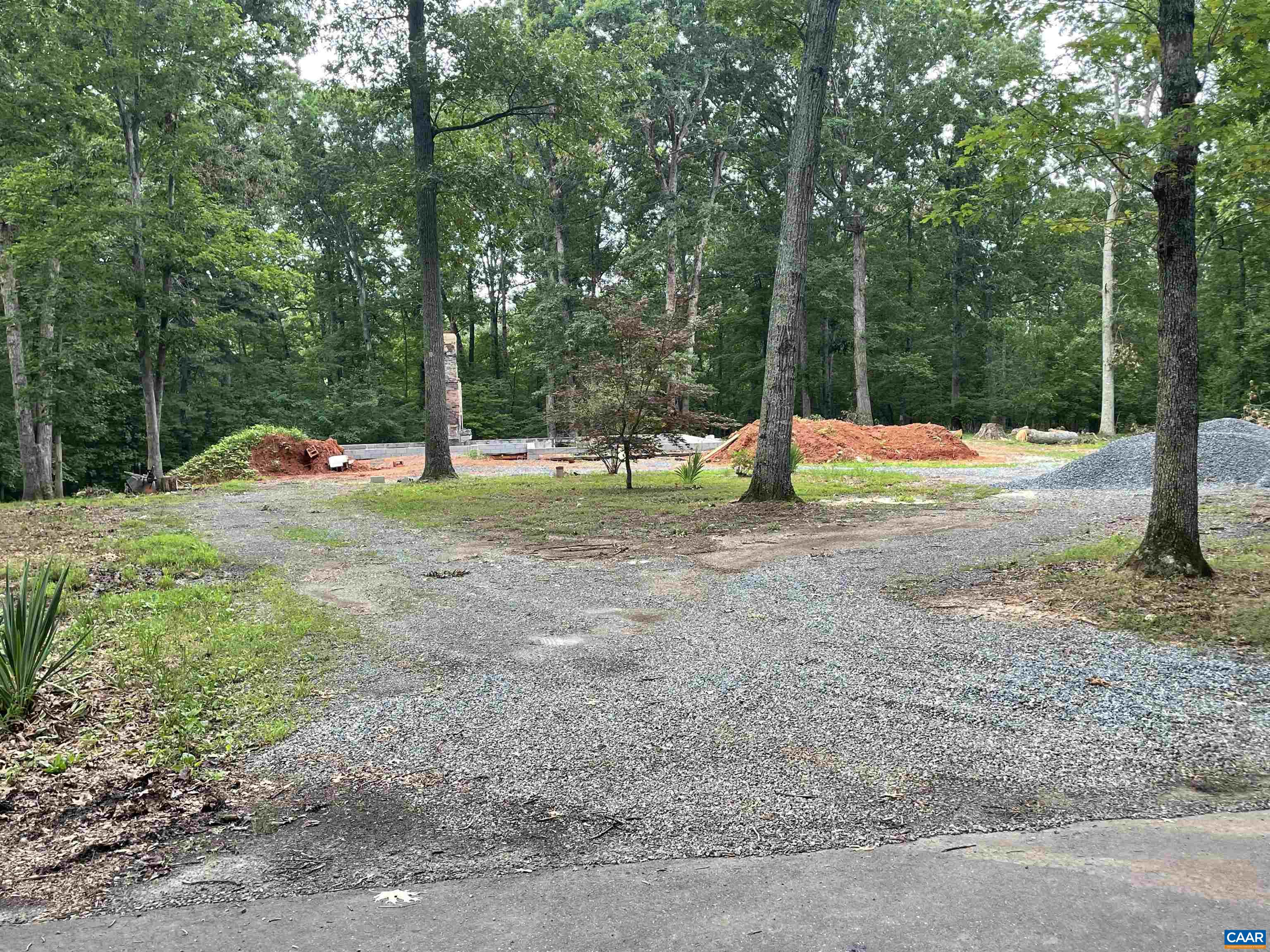 22 Crest Road Ruckersville, VA 22968 - Photo 4 of 6 a view of backyard with tree