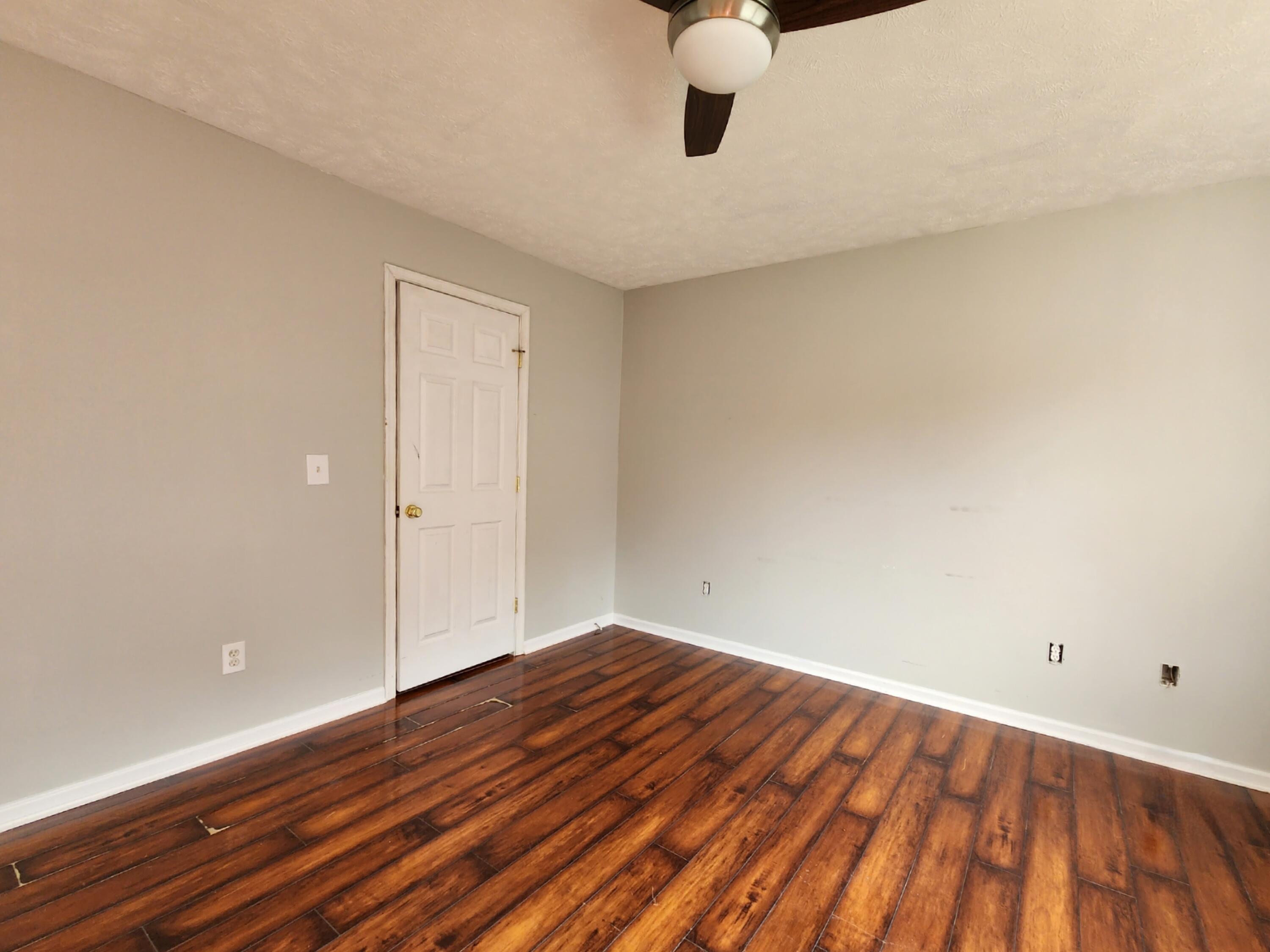 1189 Foothills Road Callaway, VA 24067 - Photo 17 of 21 a view of an empty room with wooden floor