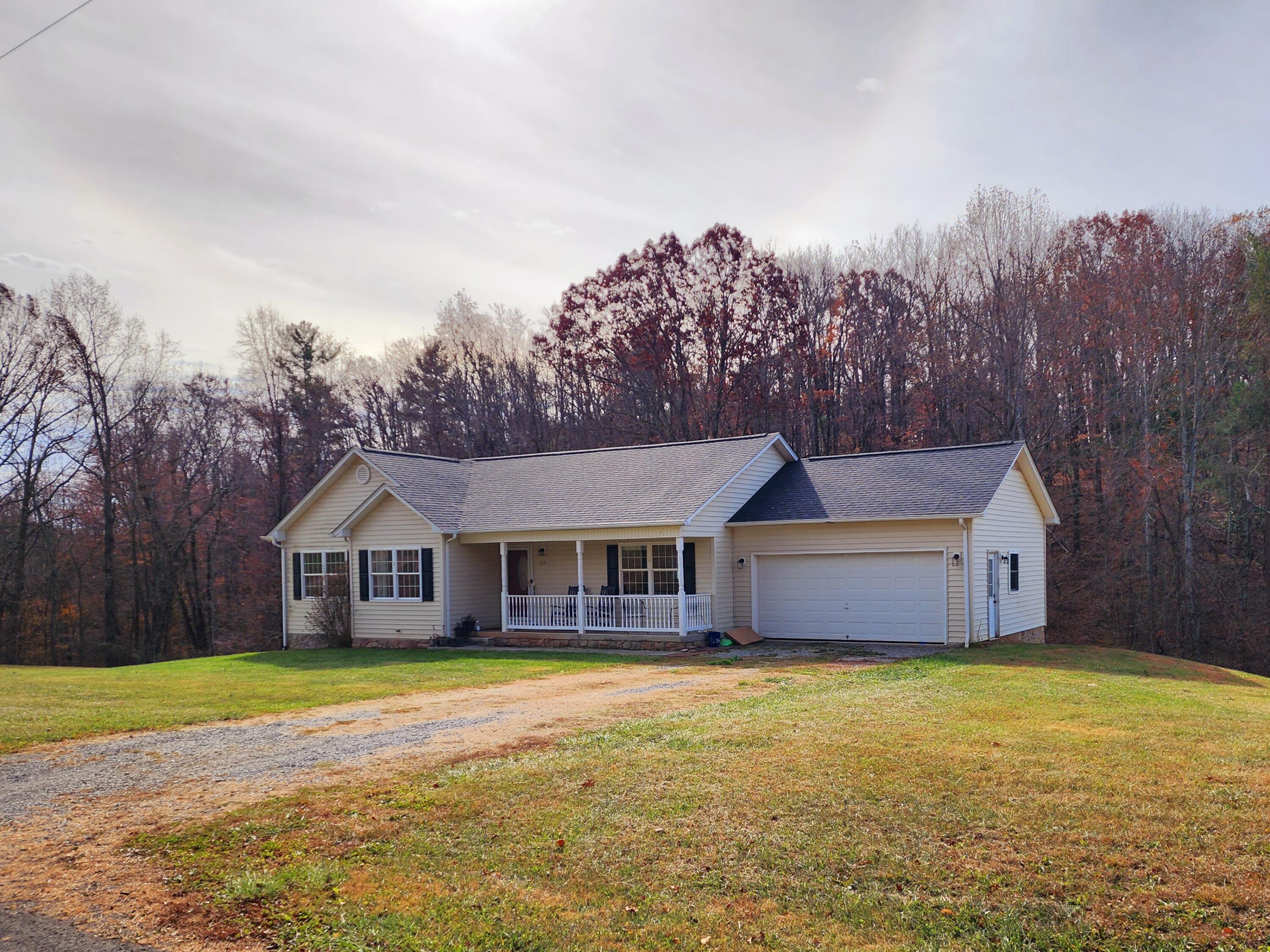 1189 Foothills Road Callaway, VA 24067 - Photo 2 of 21 a front view of a house with garden