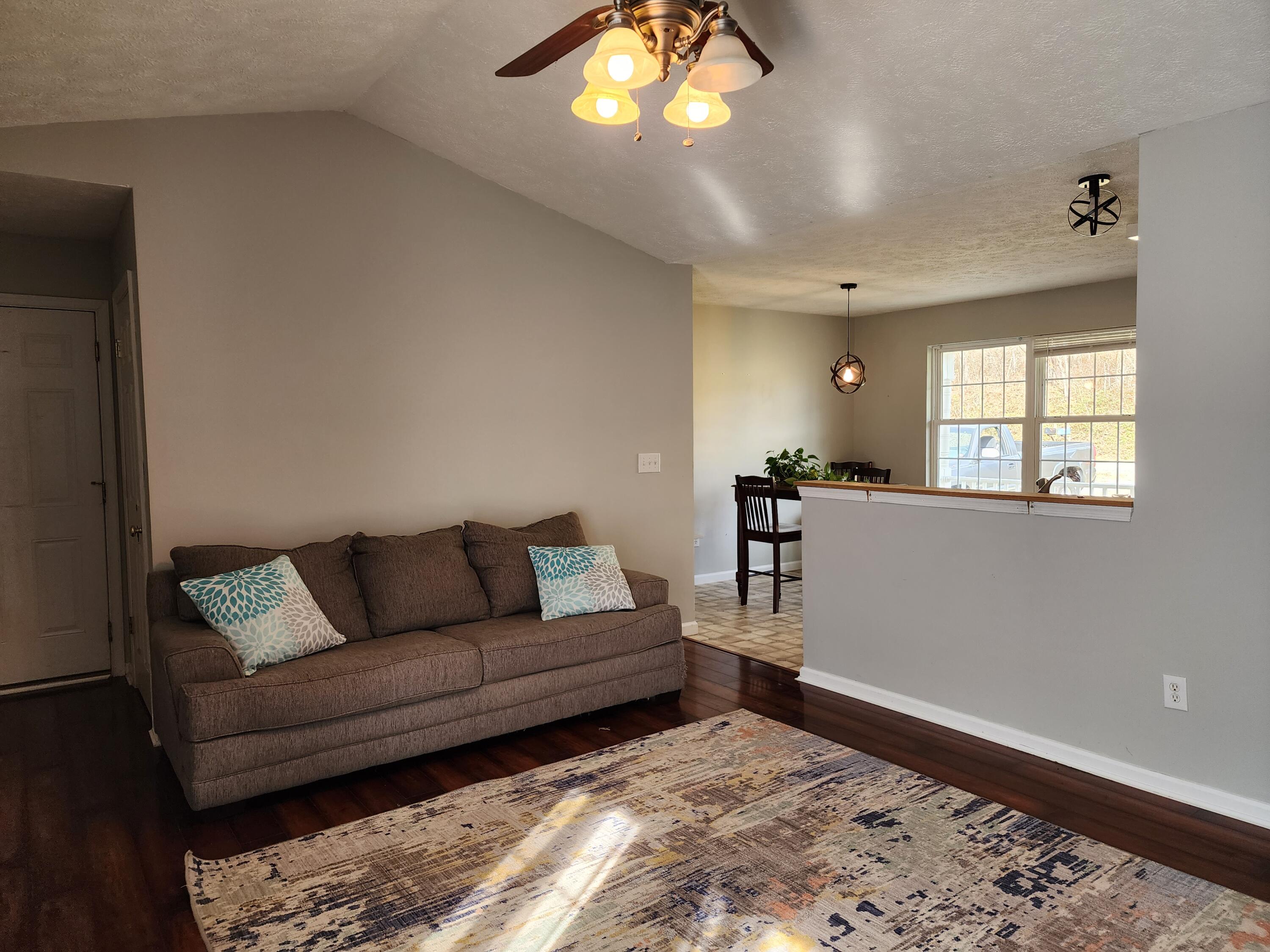 1189 Foothills Road Callaway, VA 24067 - Photo 4 of 21 a living room with furniture and a large window