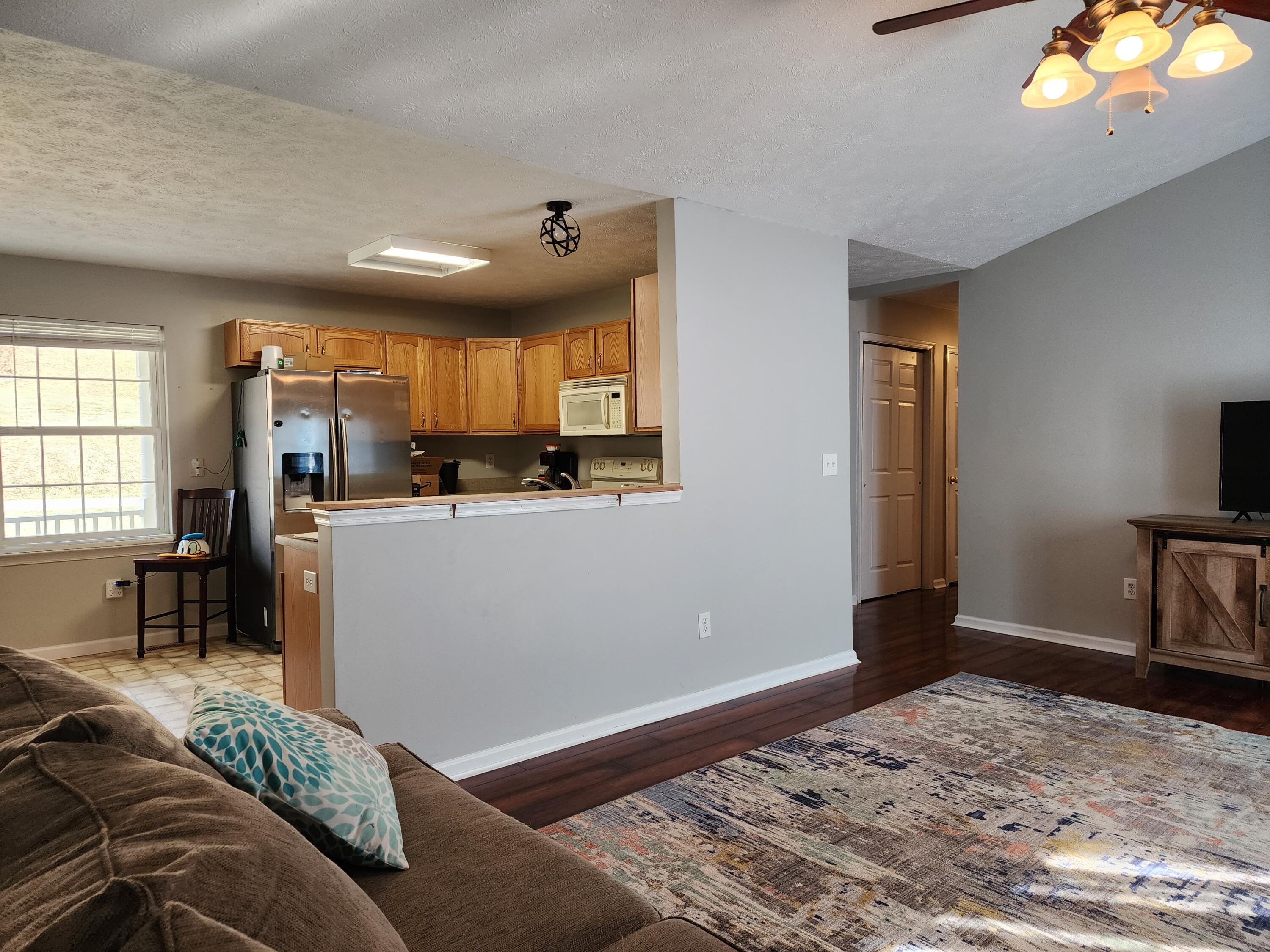 1189 Foothills Road Callaway, VA 24067 - Photo 5 of 21 a living room with furniture and a flat screen tv