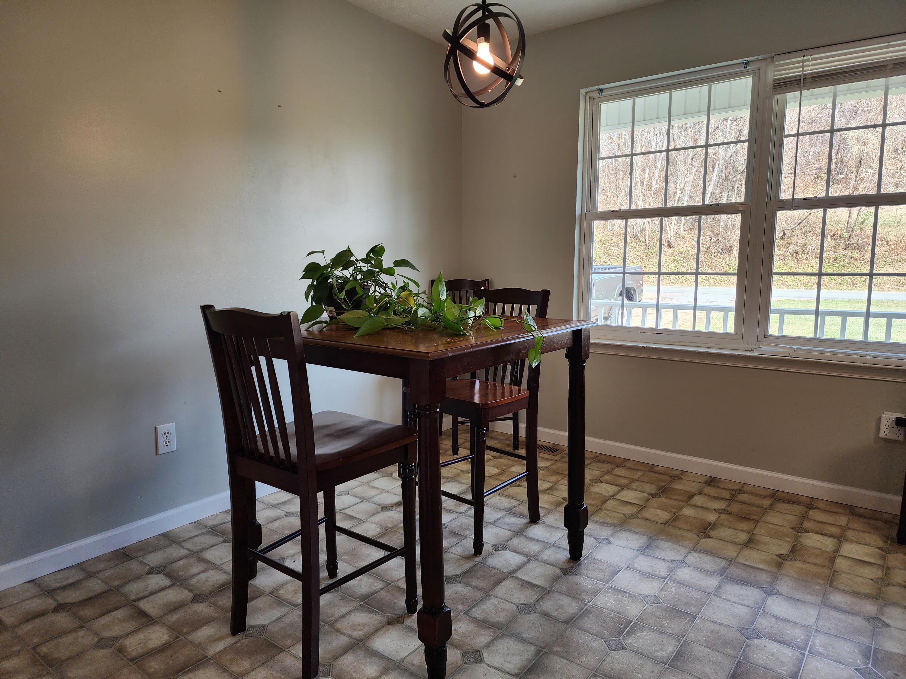 1189 Foothills Road Callaway, VA 24067 - Photo 6 of 21 a dining room with furniture and window
