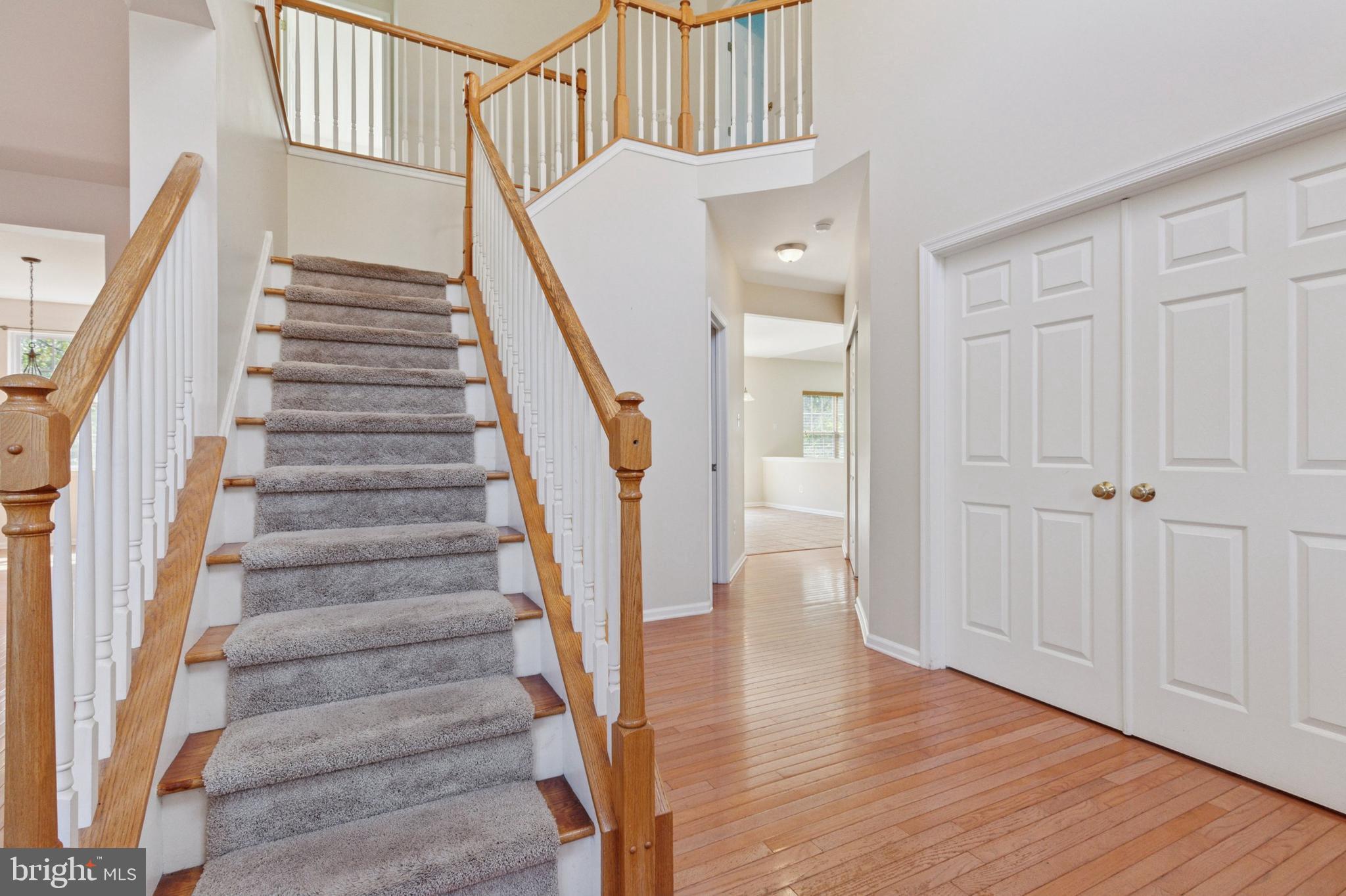 456 Windy Hill Road Gilbertsville, PA 19525 - Photo 22 of 46 a view of entryway with wooden floor and stairs