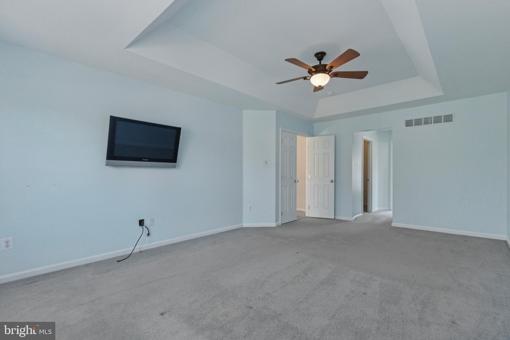456 Windy Hill Road Gilbertsville, PA 19525 - Photo 24 of 46 a view of a livingroom with a ceiling fan a ceiling fan and a window