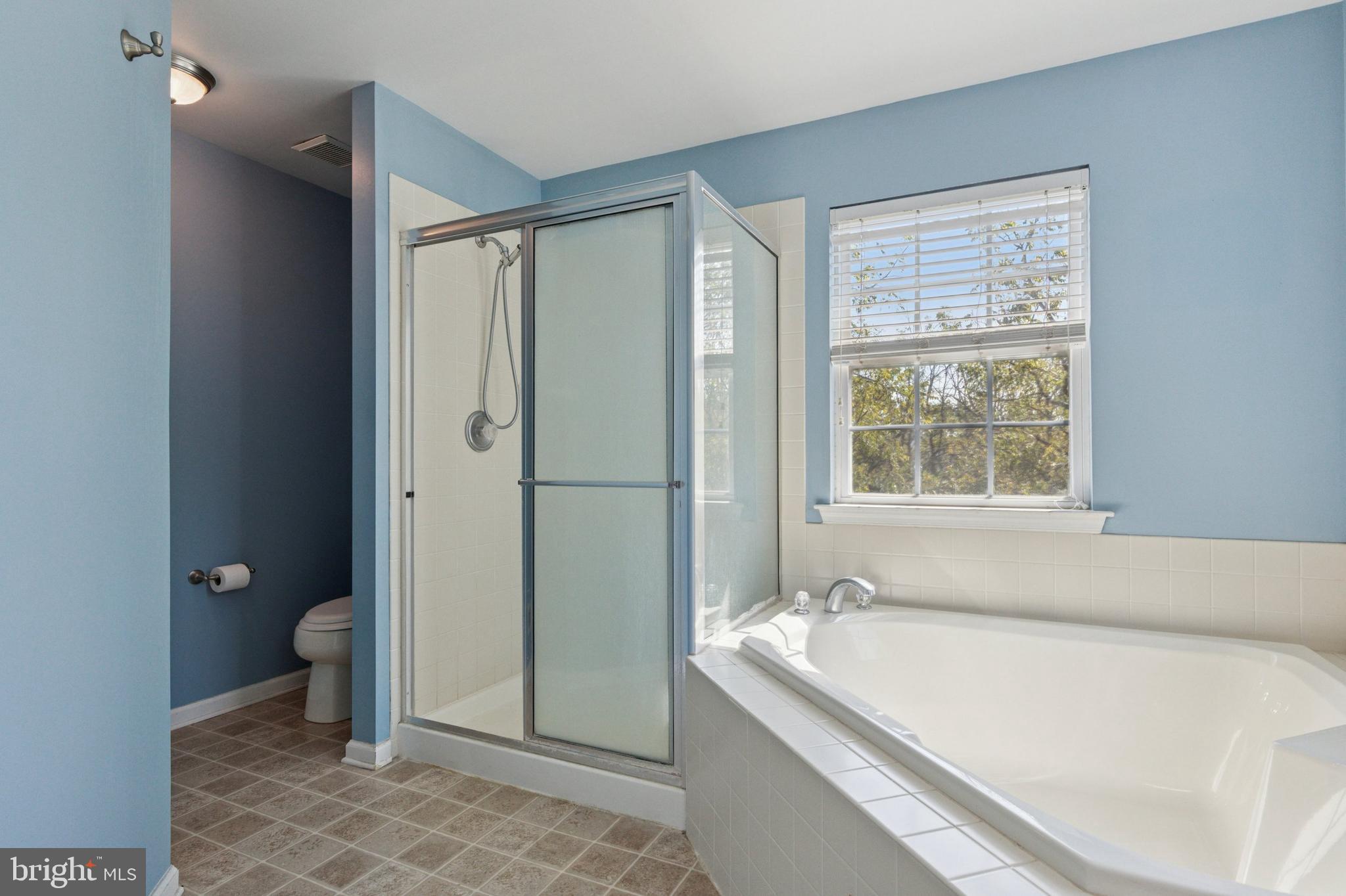 456 Windy Hill Road Gilbertsville, PA 19525 - Photo 26 of 46 a bathroom with a granite countertop sink a toilet and shower