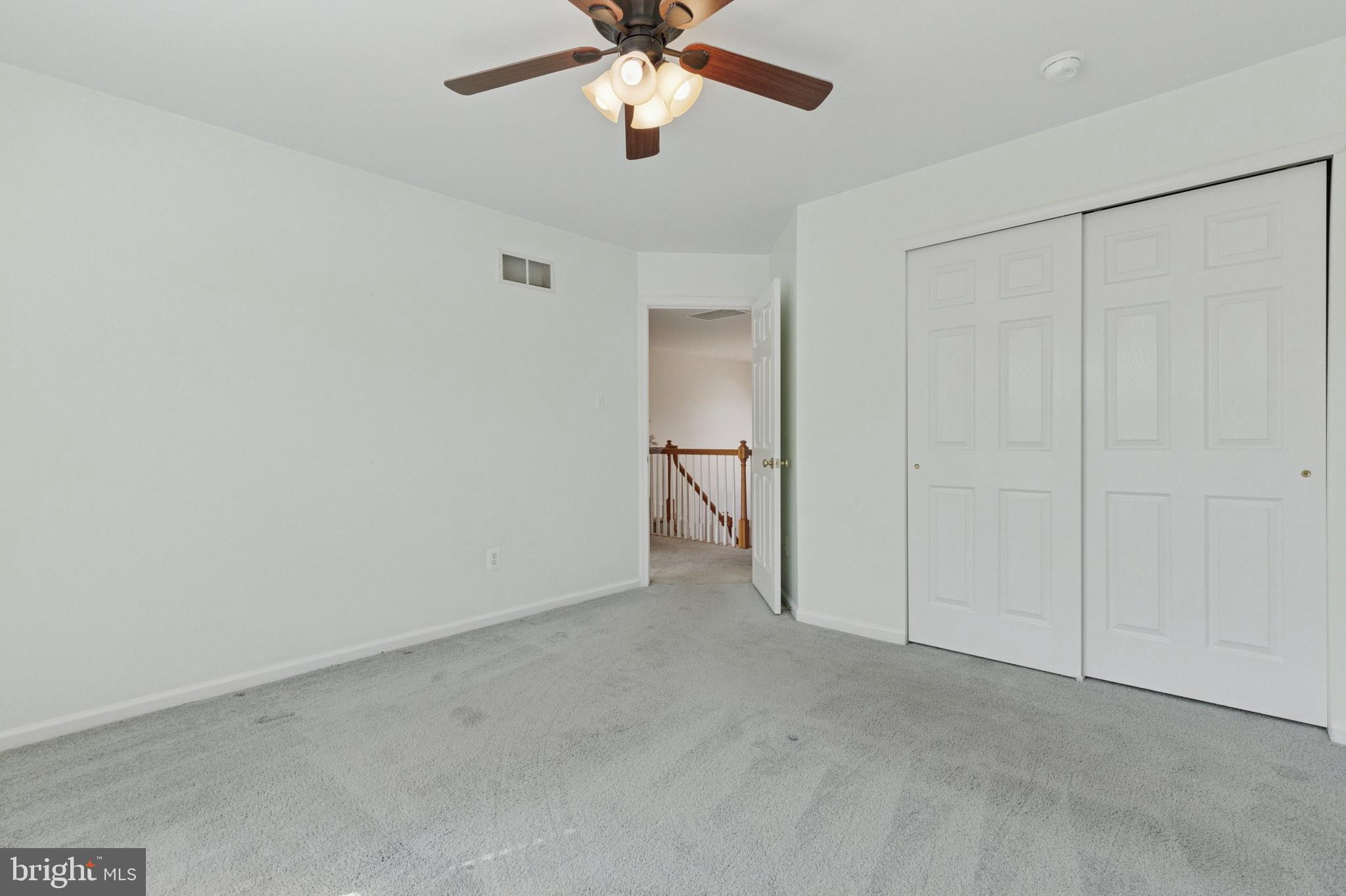 456 Windy Hill Road Gilbertsville, PA 19525 - Photo 32 of 46 an empty room with chandelier fan
