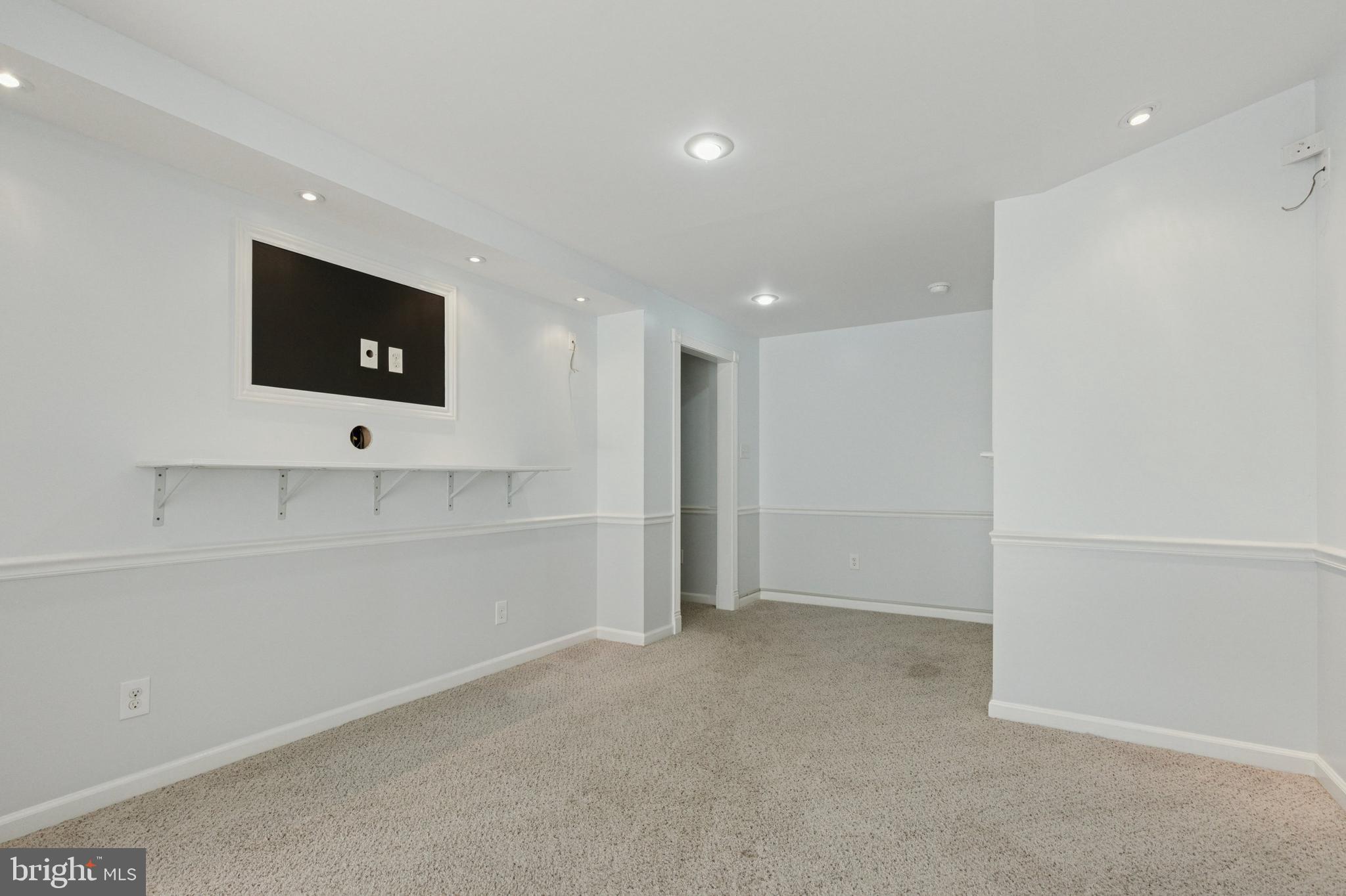 456 Windy Hill Road Gilbertsville, PA 19525 - Photo 34 of 46 a view of a livingroom with an empty space & a window