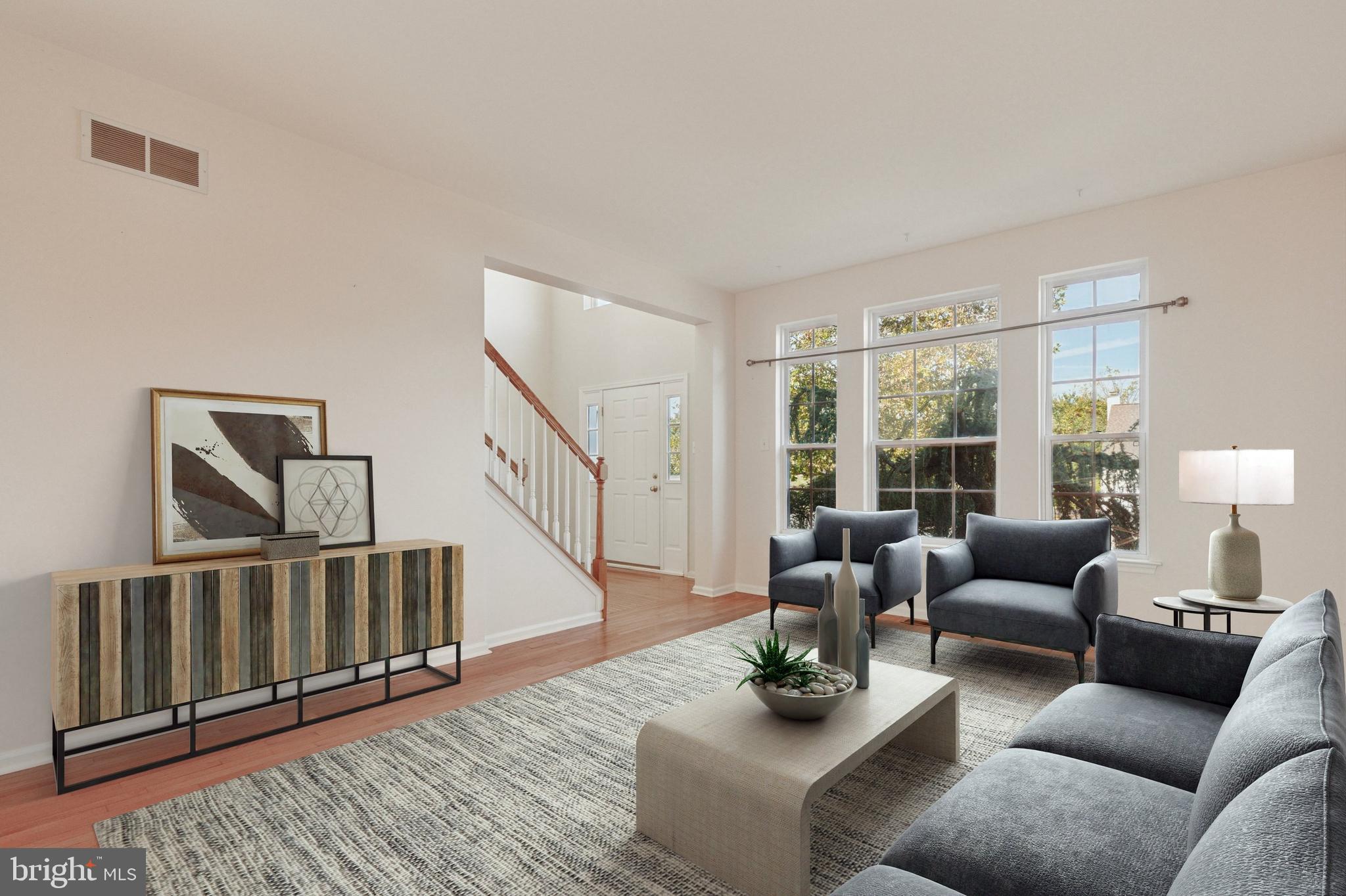 456 Windy Hill Road Gilbertsville, PA 19525 - Photo 4 of 46 a living room with furniture and a large window