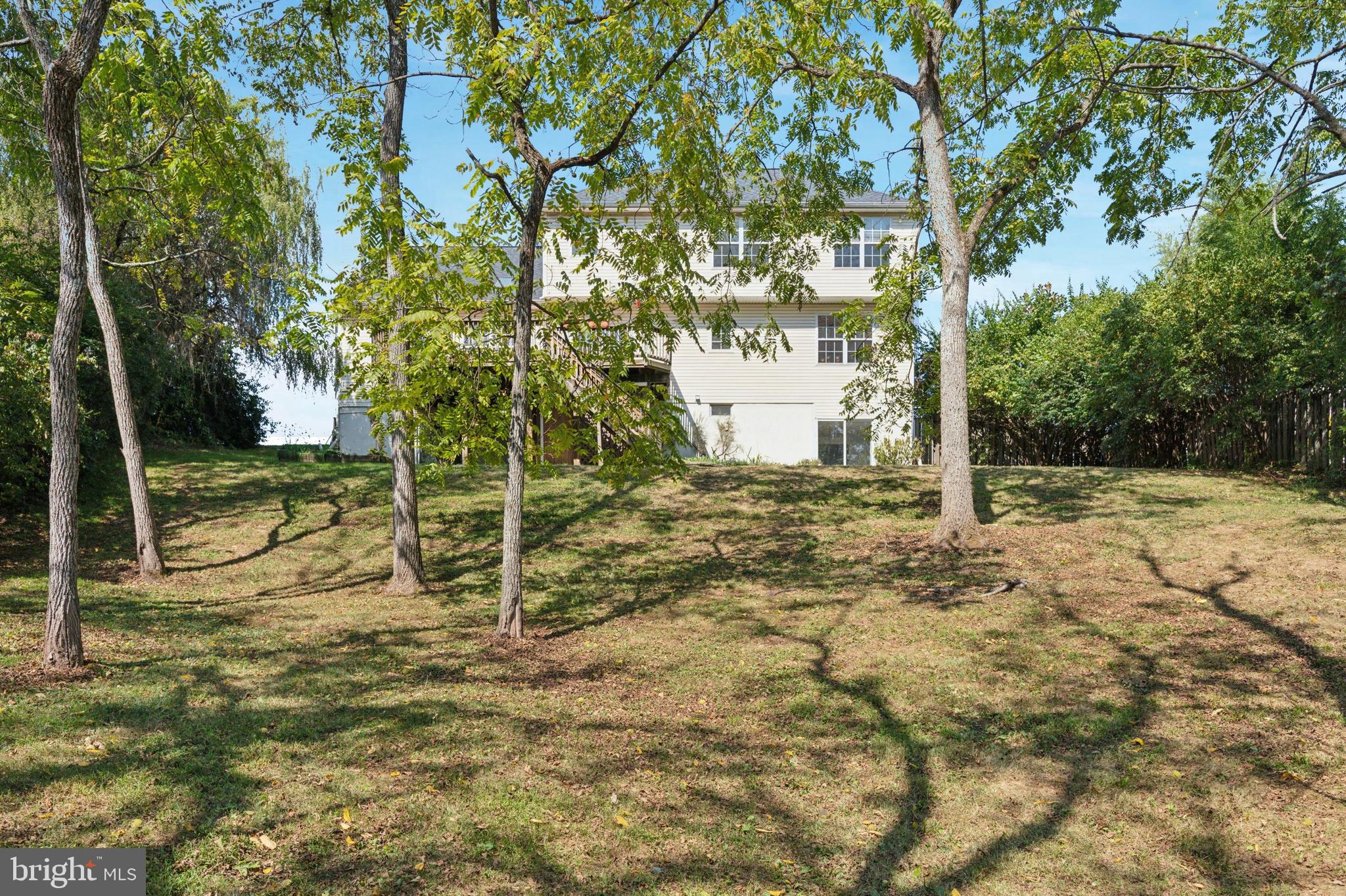 456 Windy Hill Road Gilbertsville, PA 19525 - Photo 42 of 46 a backyard of a house with lots of green space