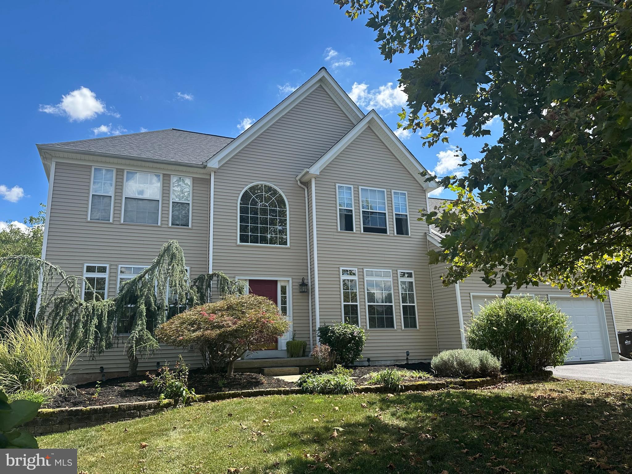 456 Windy Hill Road Gilbertsville, PA 19525 - Photo 45 of 46 a front view of house with yard and trees around