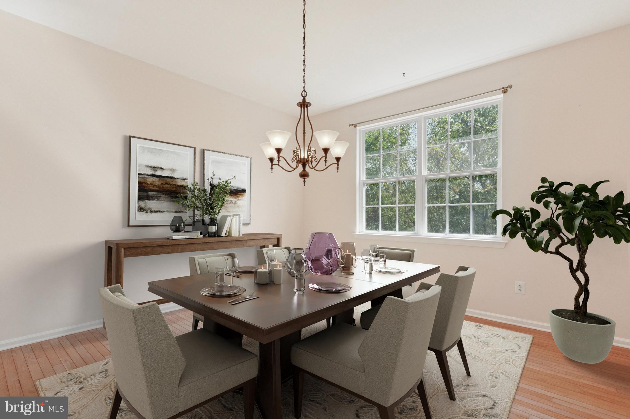 456 Windy Hill Road Gilbertsville, PA 19525 - Photo 5 of 46 a view of a dining room with furniture window and wooden floor