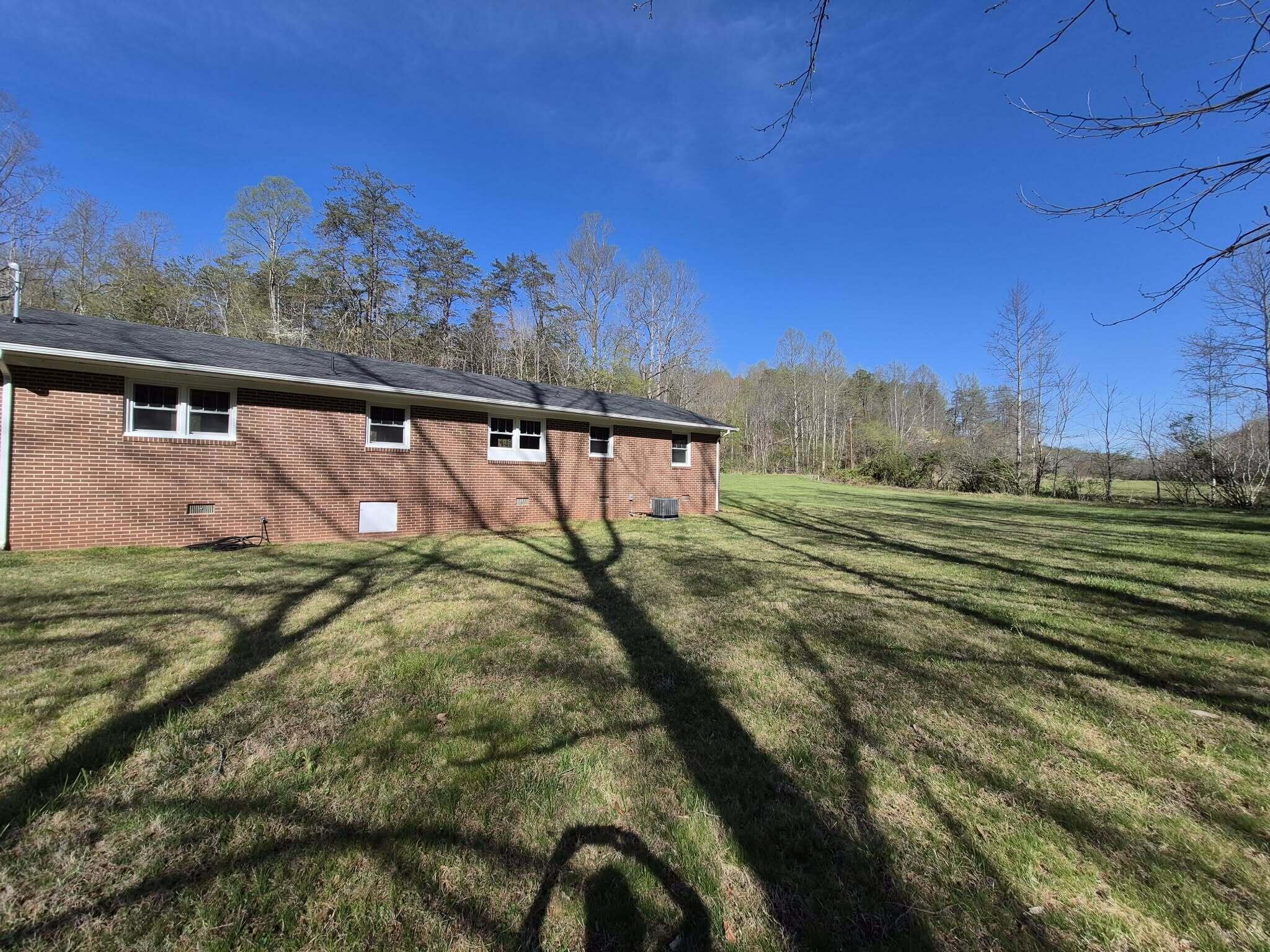 1232 Prillaman Switch Road Ferrum, VA 24088 - Photo 10 of 50 a view of a yard with an outdoor space