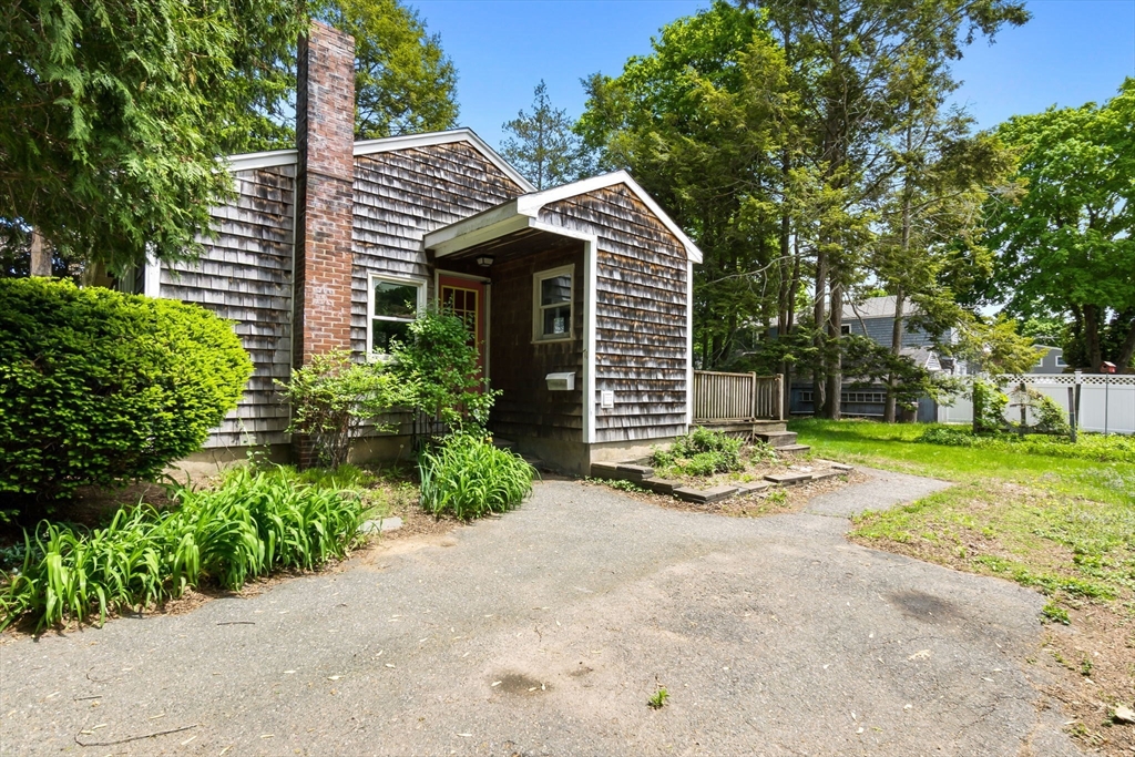71 Union Street Hamilton, MA 01982 - Photo 18 of 21 a view of a house with backyard and trees