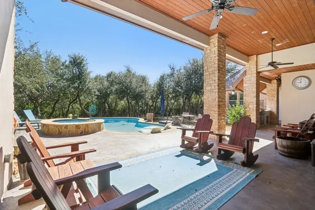 a view of backyard with seating space