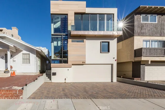 a front view of a house with a garage