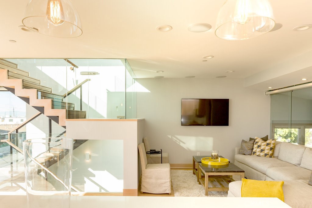 814 Monterey Boulevard Hermosa Beach, CA 90254 - Photo 12 of 28 a living room with furniture and a flat screen tv