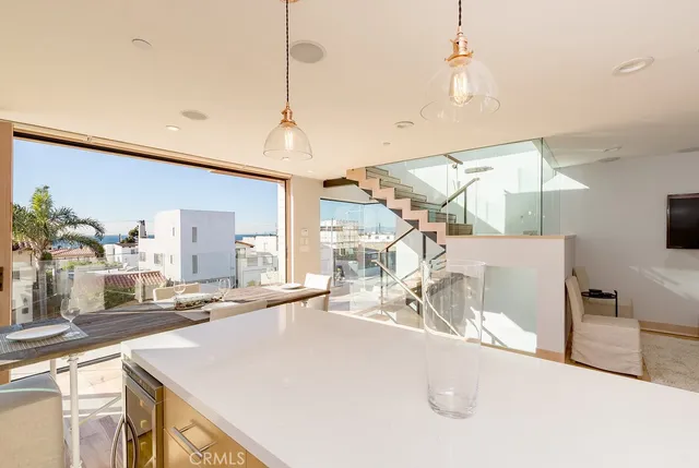 a room with sink and mirror