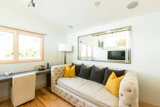 a living room with a couch and a flat screen tv