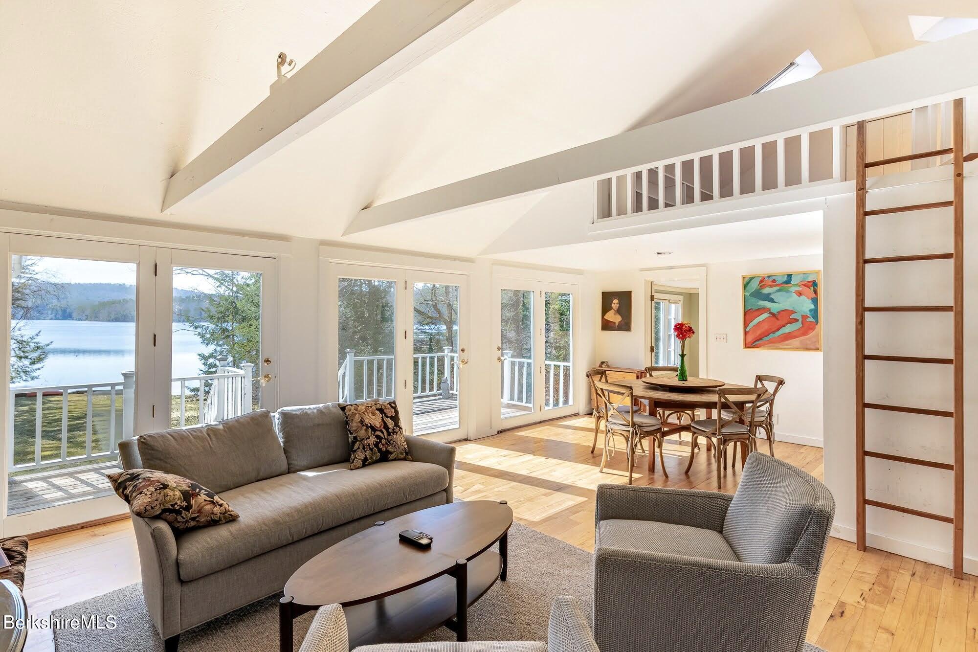 7 Point Road Monterey, MA 01245 - Photo 12 of 41 a living room with furniture and a large window