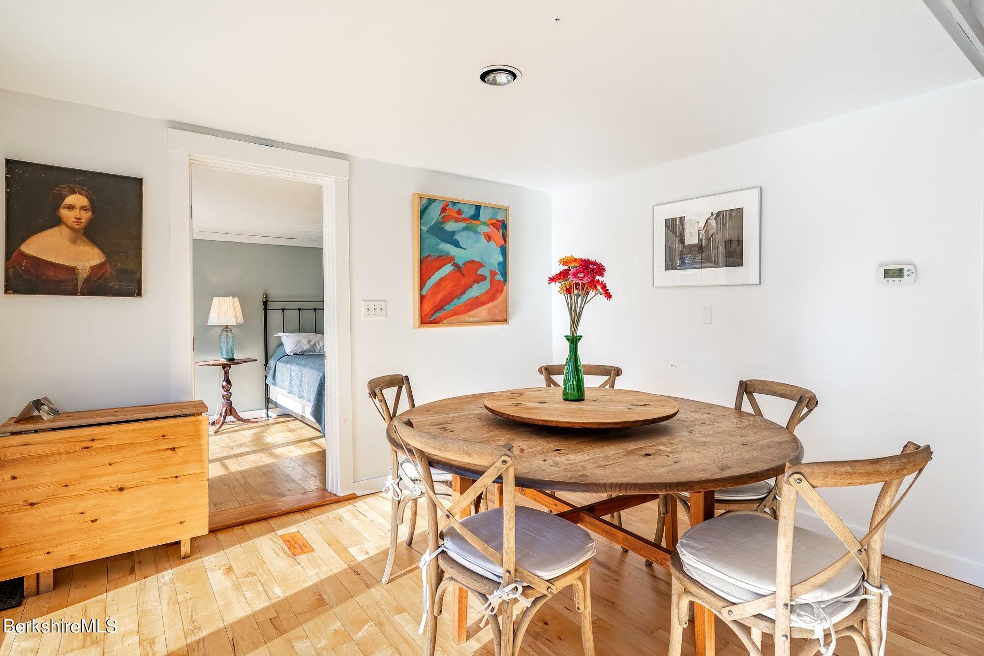 7 Point Road Monterey, MA 01245 - Photo 15 of 41 a view of a dining room with furniture