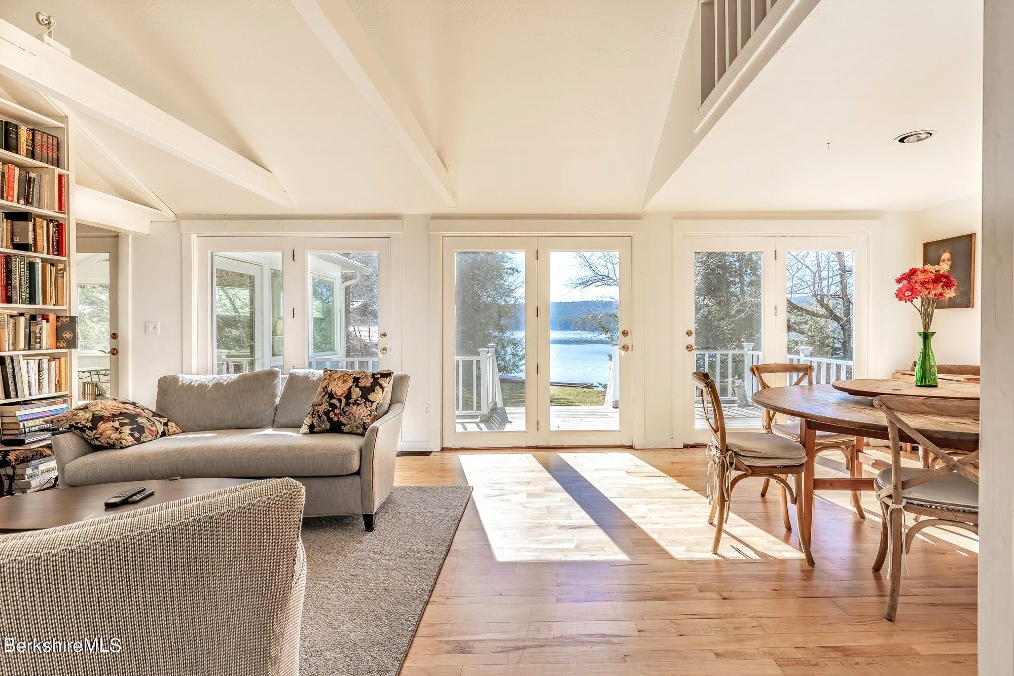 7 Point Road Monterey, MA 01245 - Photo 5 of 41 a living room with furniture and a floor to ceiling window