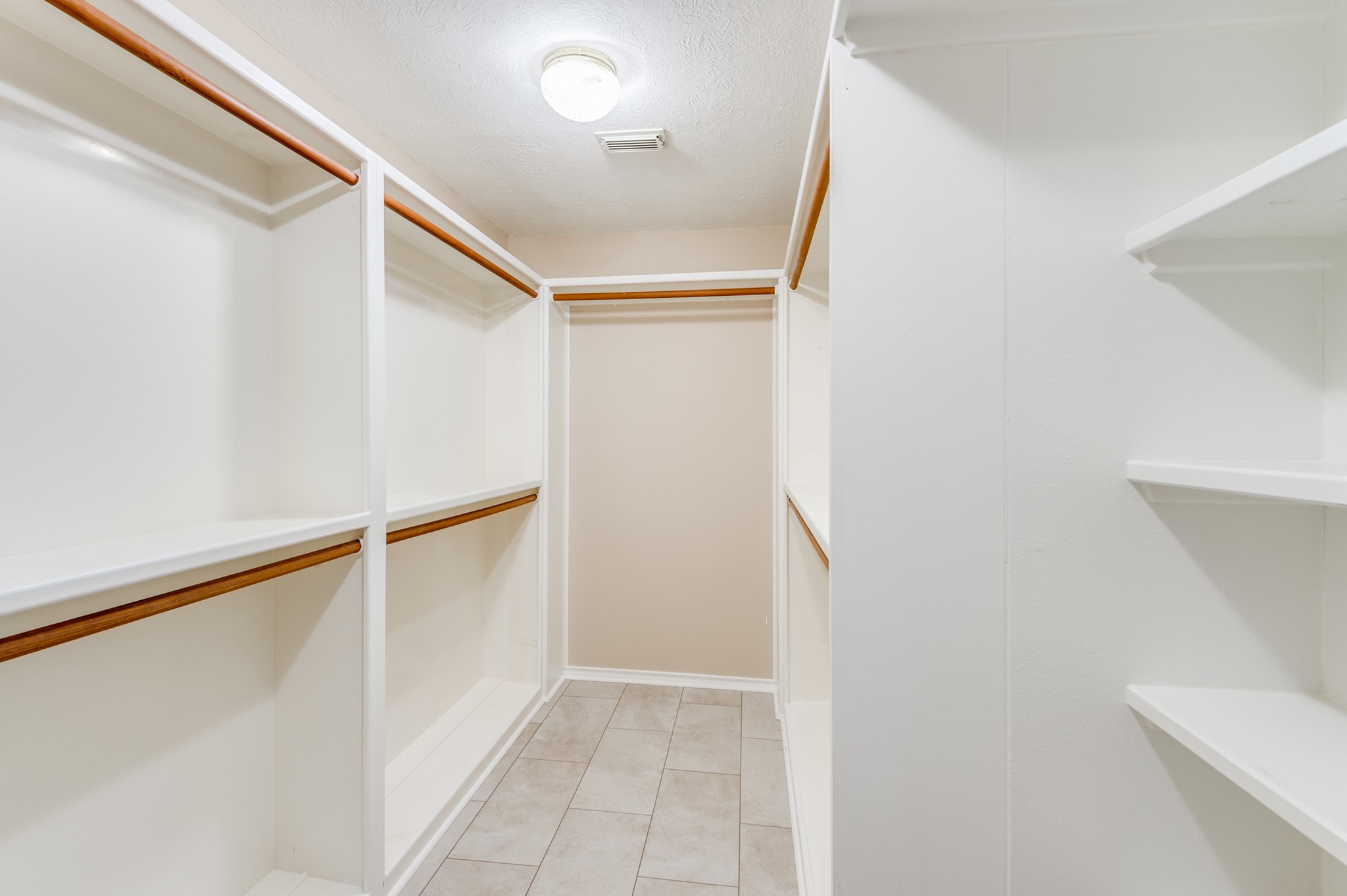 341 Sam Houston Loop Point Blank, TX 77364 - Photo 19 of 36 a view of walk in closet