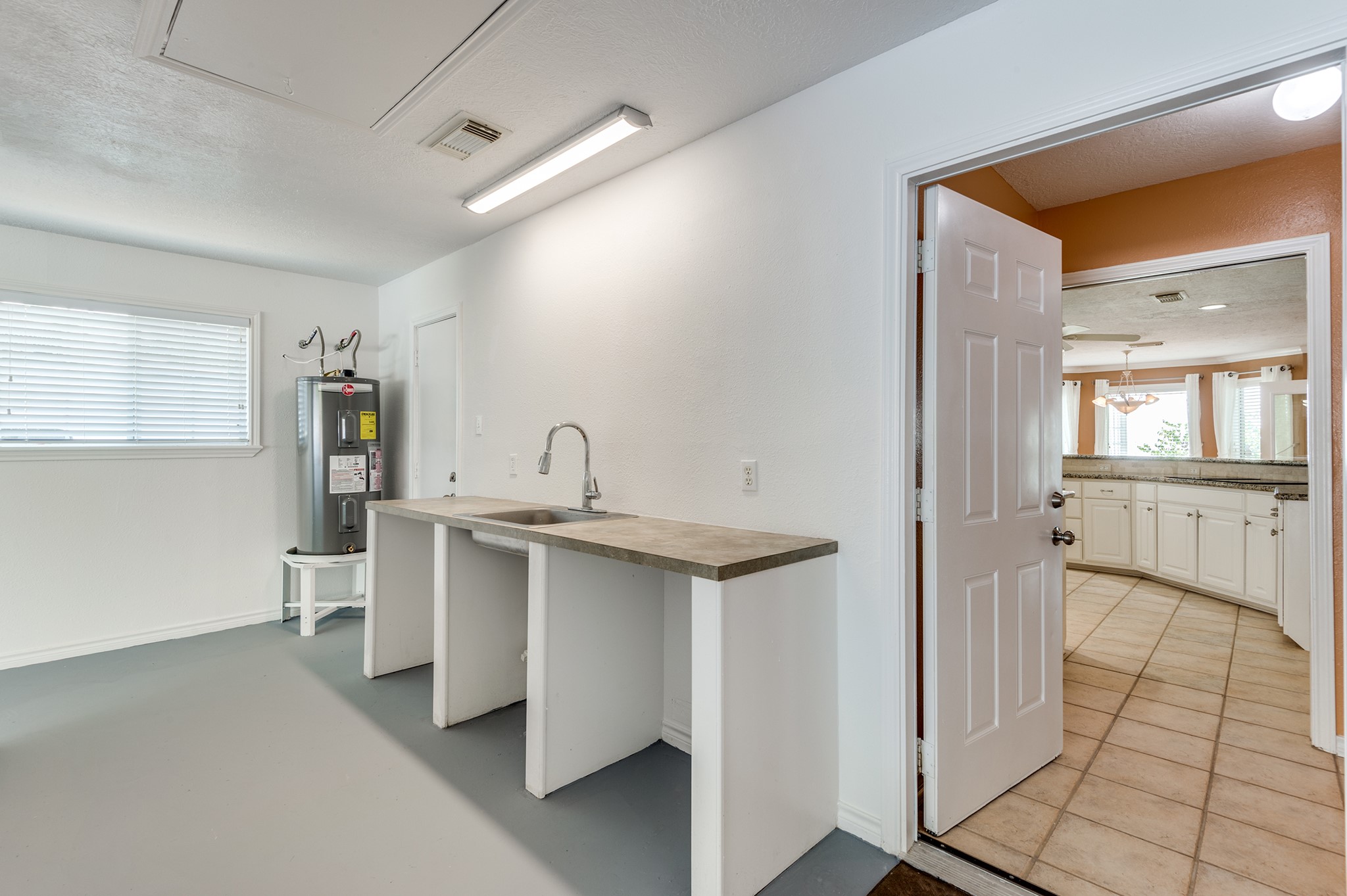 341 Sam Houston Loop Point Blank, TX 77364 - Photo 24 of 36 a kitchen with a sink stainless steel appliances and cabinets