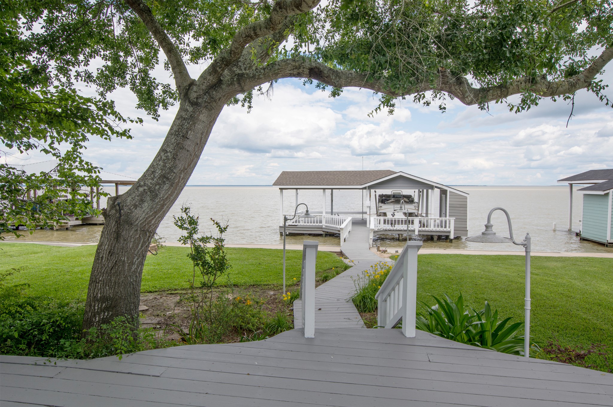 341 Sam Houston Loop Point Blank, TX 77364 - Photo 27 of 36 a view of a house with a yard