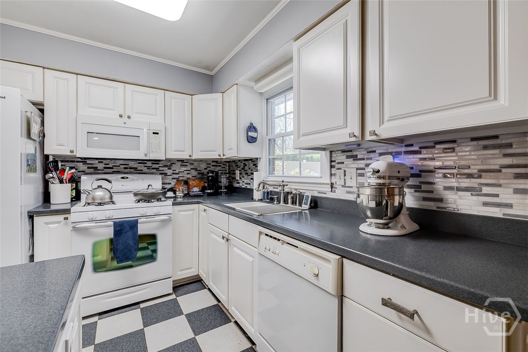 12606 Sunnybrook Road Savannah, GA 31419 - Photo 11 of 39 Ample counter space and a view to the beautiful back yard