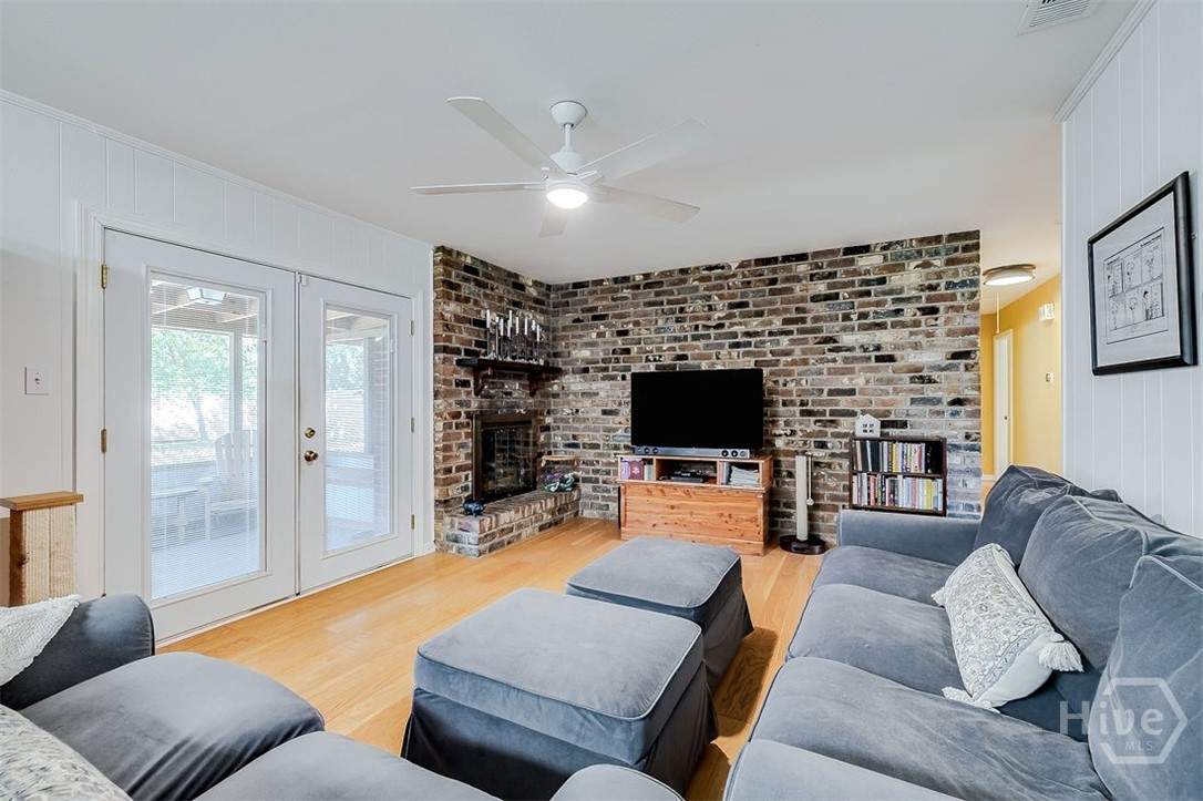 12606 Sunnybrook Road Savannah, GA 31419 - Photo 15 of 39 This 12'7 X 17' Family room is open to the kitchen everyone can be close even when preparing meals.