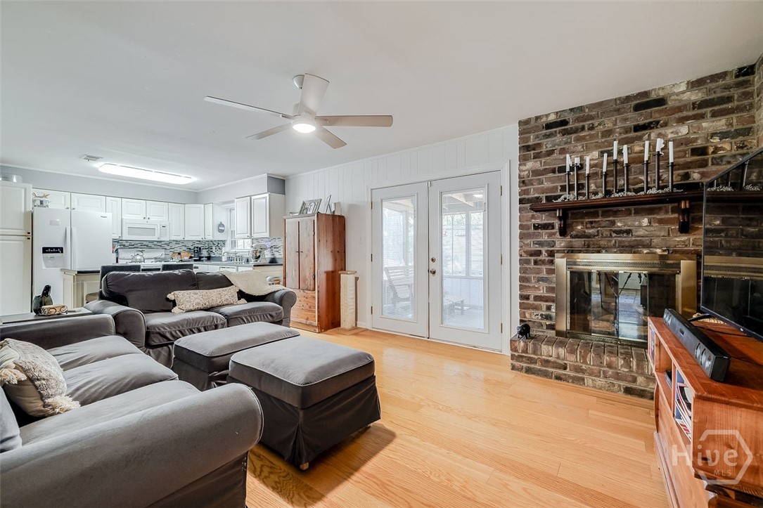 12606 Sunnybrook Road Savannah, GA 31419 - Photo 18 of 39 Yes, that is a really nice screed porch adjoined with the double doors.