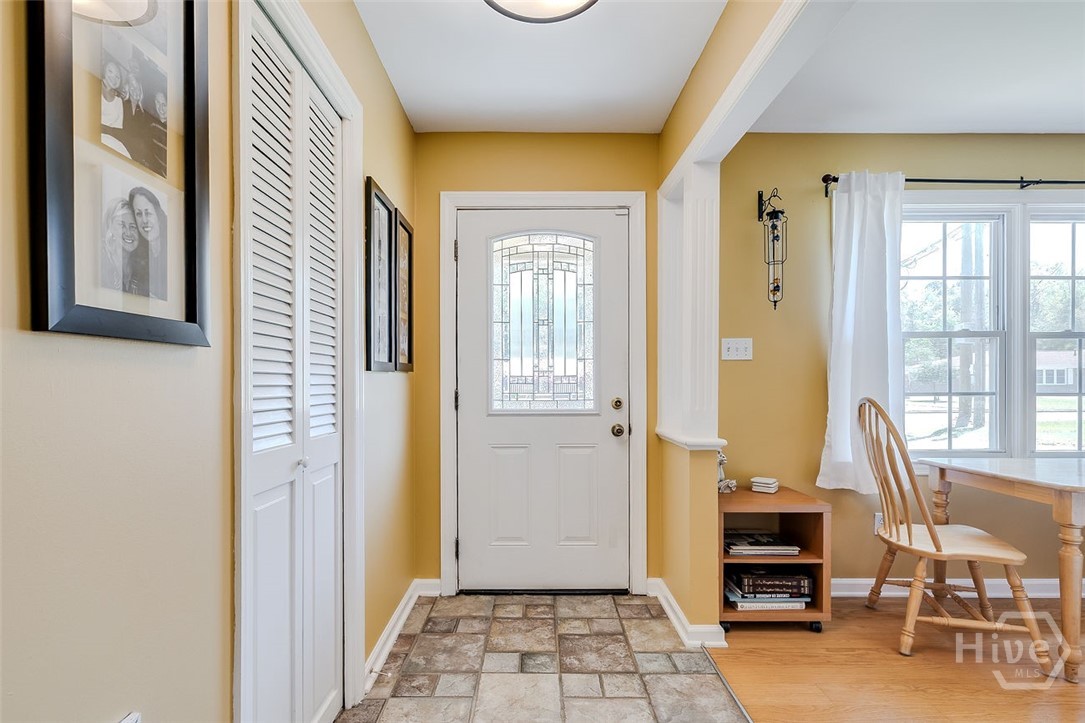 12606 Sunnybrook Road Savannah, GA 31419 - Photo 6 of 39 Foyer with coat closet open to the living room