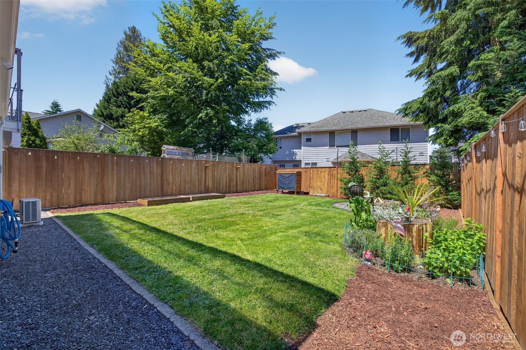 629 Bing Road, Unit B Lynnwood, WA 98036 - Photo 26 of 27 a view of a house with backyard and sitting area