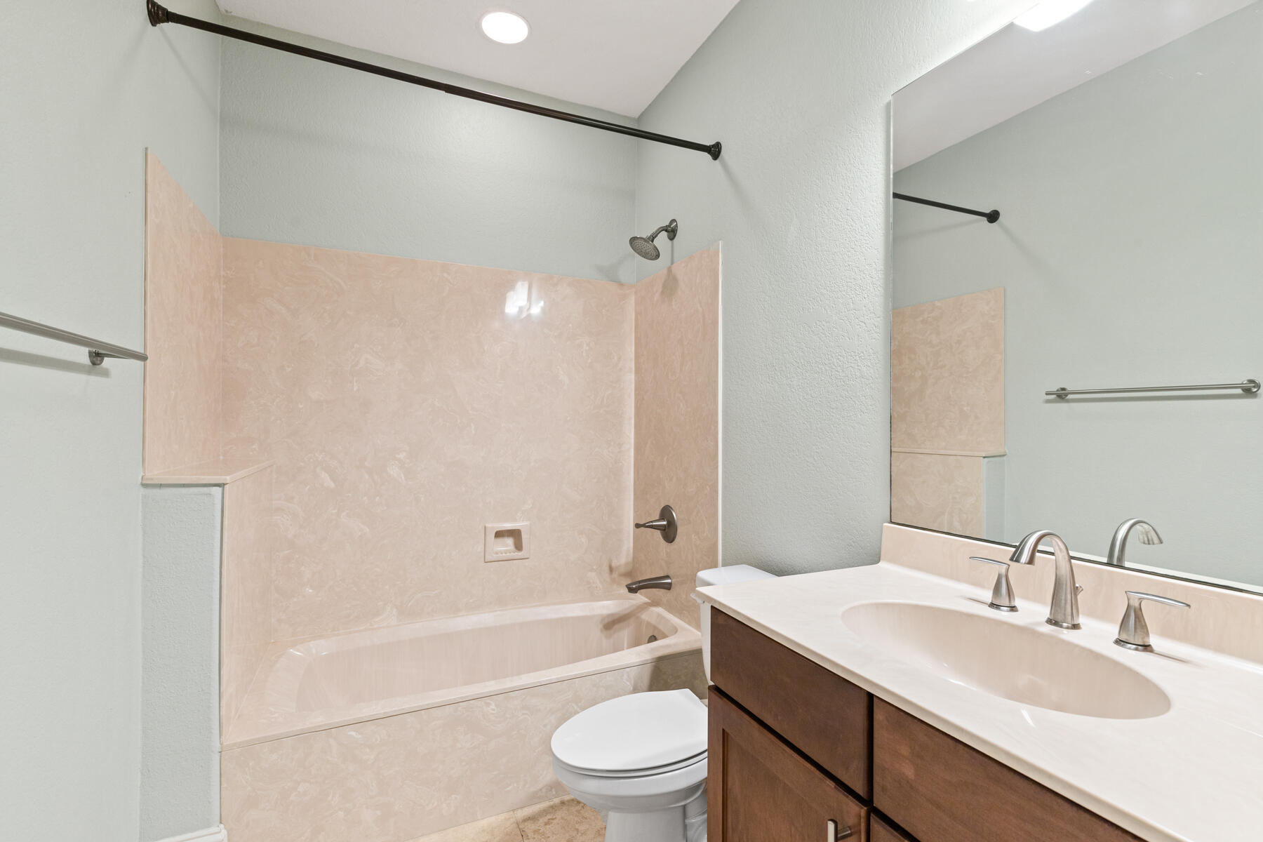 496 Soundview Court Mary Esther, FL 32569 - Photo 21 of 40 a bathroom with a granite countertop sink toilet and shower