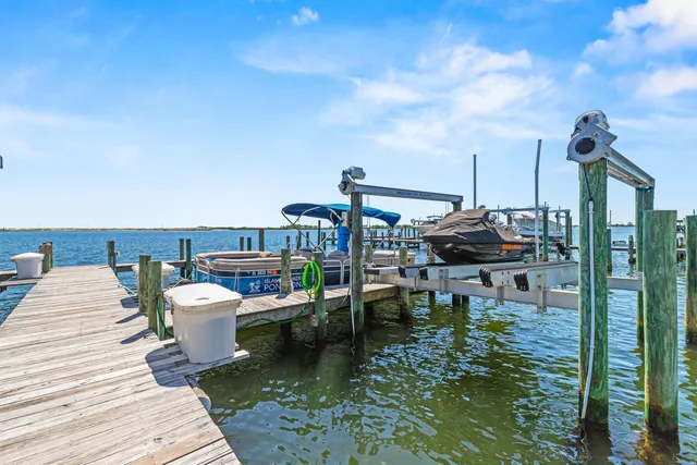 a view of a balcony with chairs