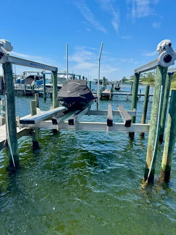a view of a backyard with sitting area
