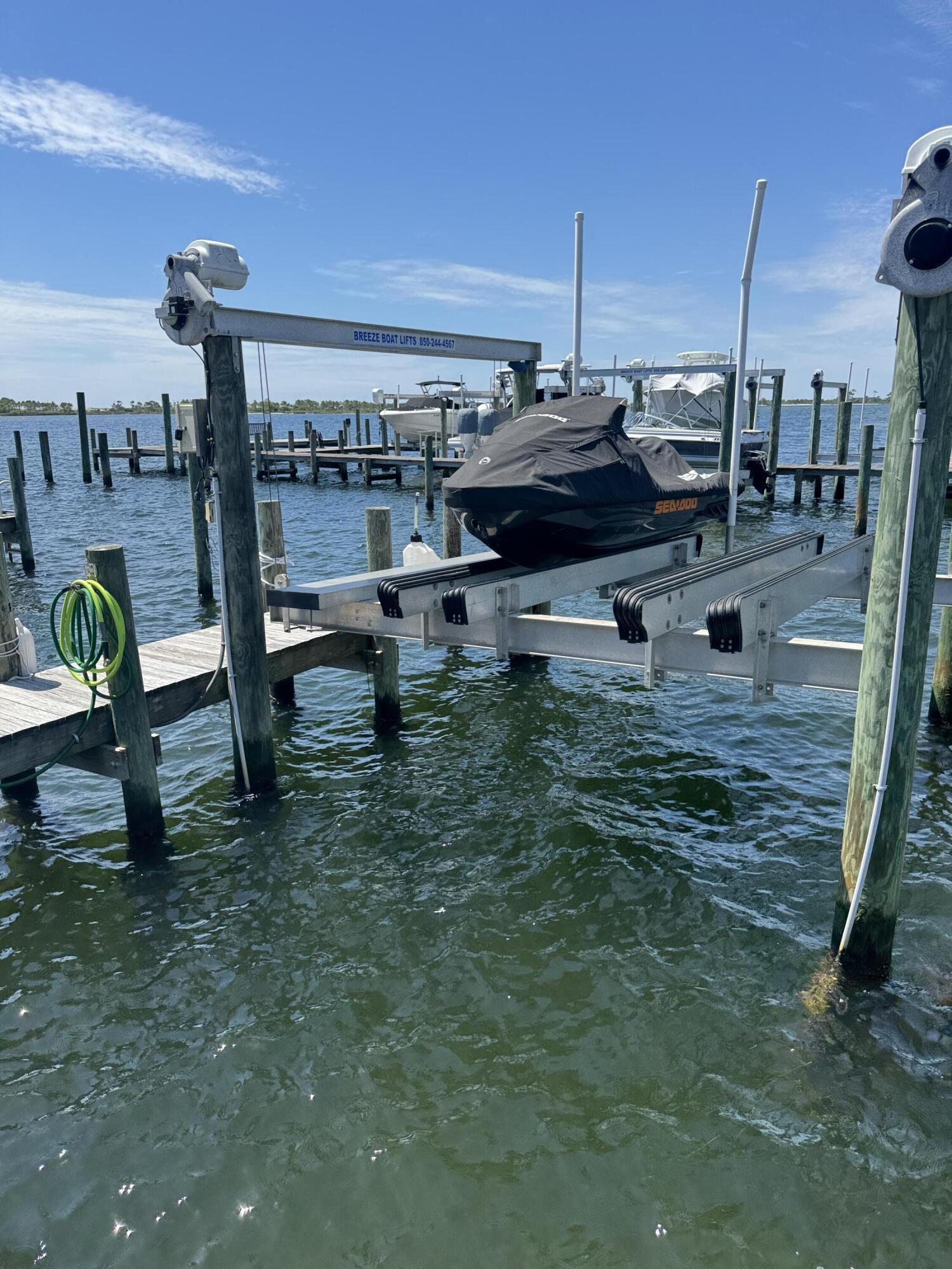 496 Soundview Court Mary Esther, FL 32569 - Photo 31 of 40 a view of a terrace with chairs