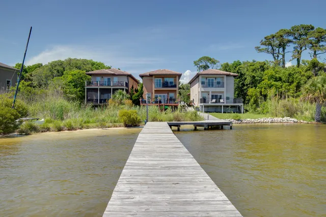 a small yard with a table and chairs