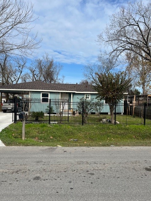 1805 Chamberlain Street Houston, TX 77093 - Photo 2 of 5 a view of a big yard in front of a house