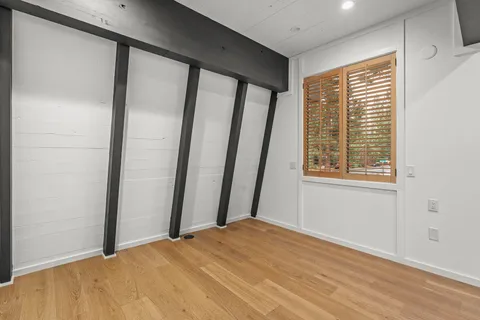 a view of a room with a large window