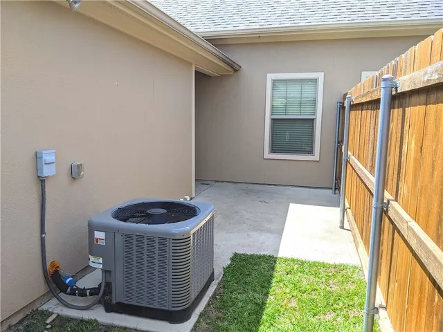 a view of entrance gate of a house