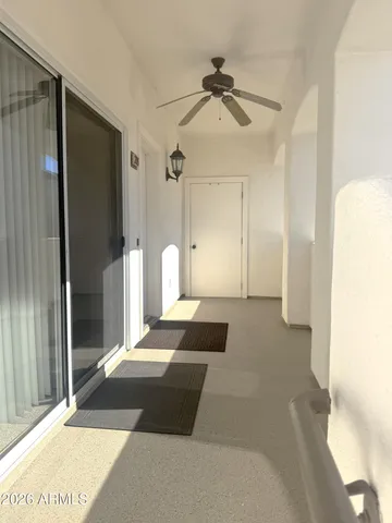 a living room with a bed and furniture