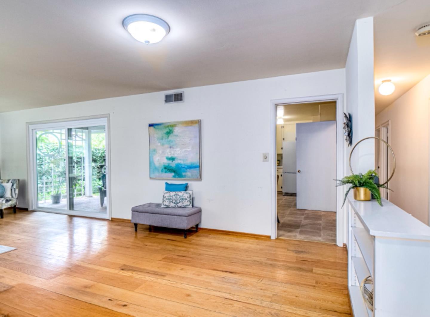 1122 Merrimac Drive Sunnyvale, CA 94087 - Photo 12 of 26 a living room with furniture and a large window