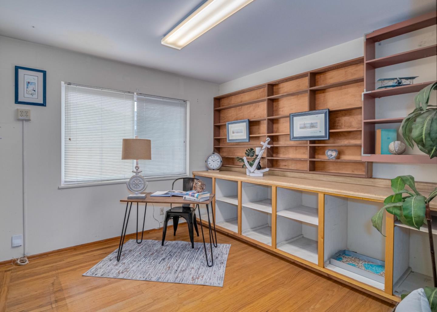 1122 Merrimac Drive Sunnyvale, CA 94087 - Photo 18 of 26 a work room with furniture and wooden floor