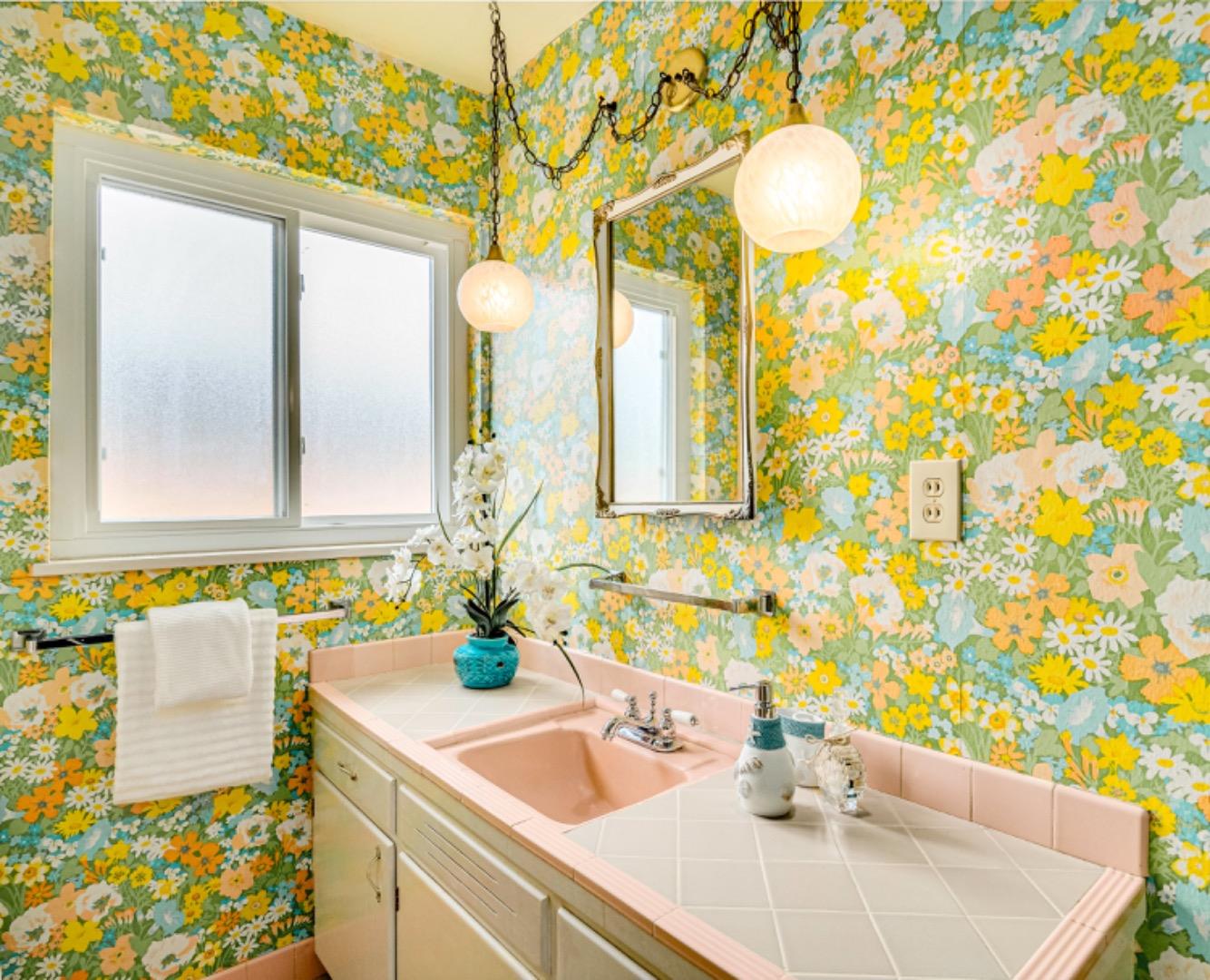 1122 Merrimac Drive Sunnyvale, CA 94087 - Photo 20 of 26 a bathroom with a sink and a mirror