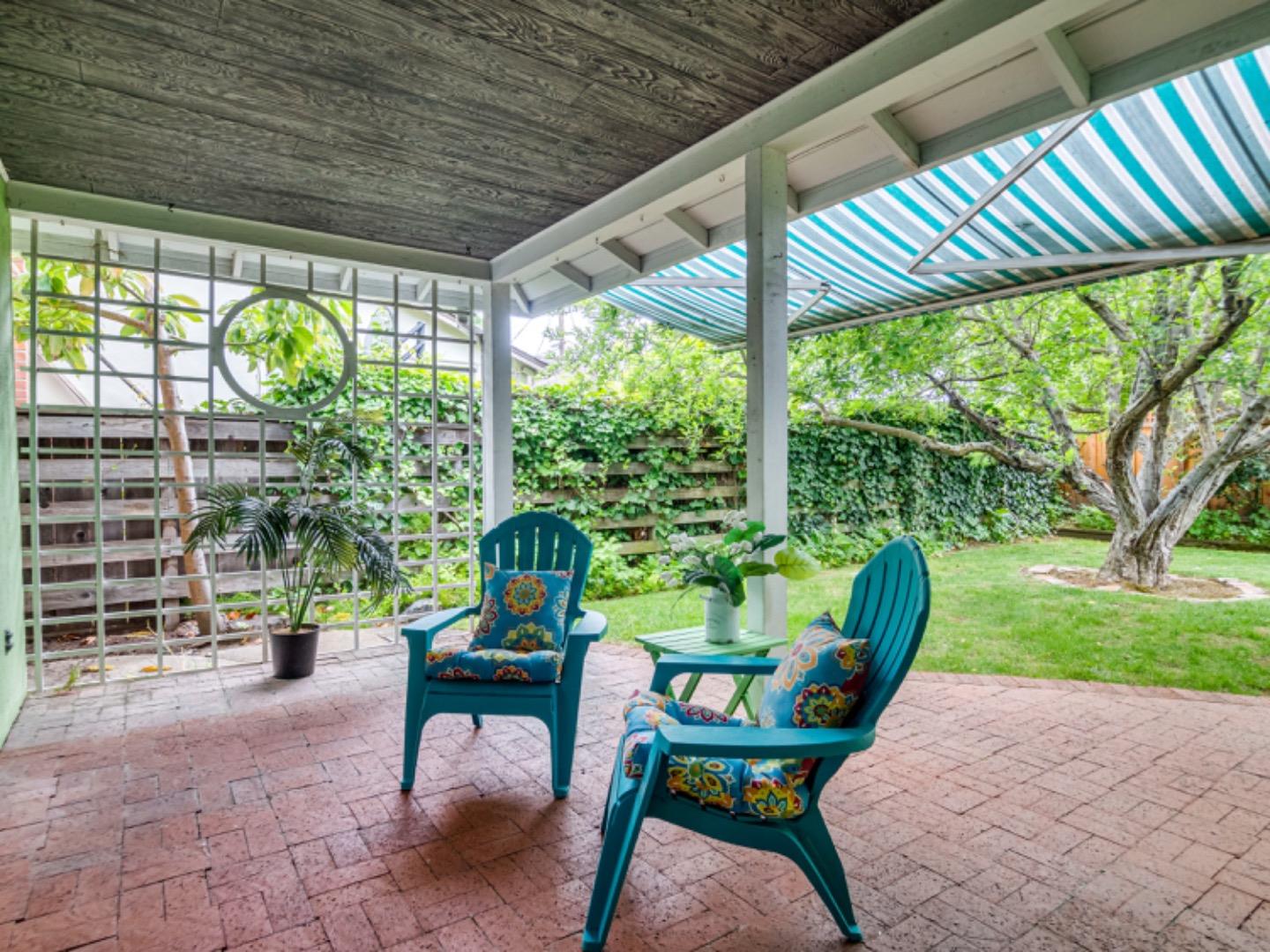 1122 Merrimac Drive Sunnyvale, CA 94087 - Photo 22 of 26 a view of a porch with furniture and a yard