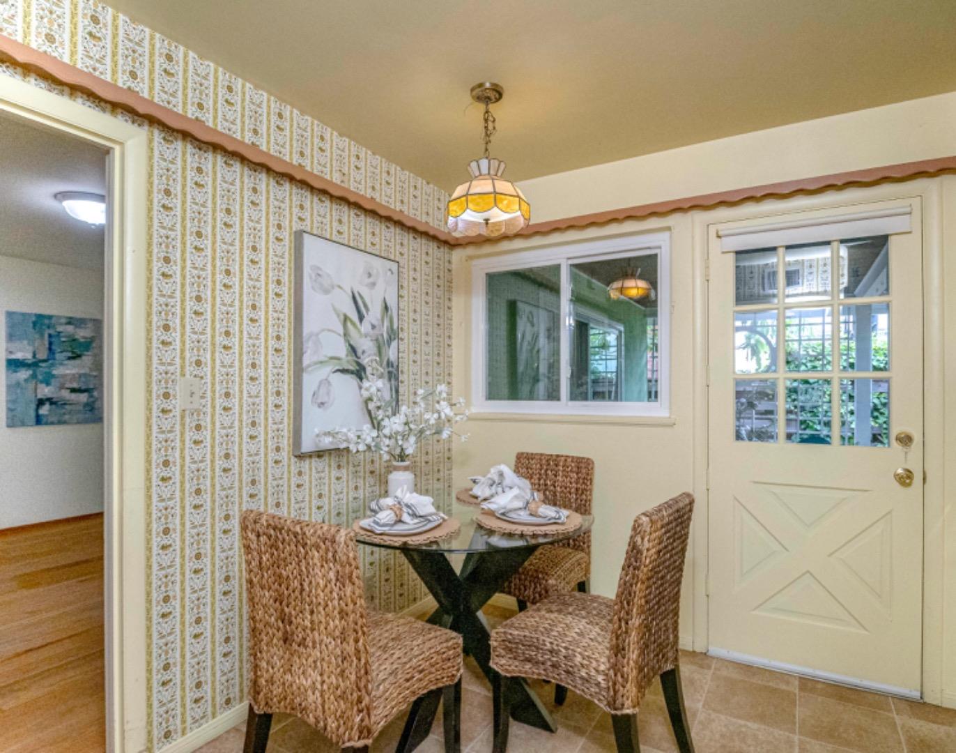 1122 Merrimac Drive Sunnyvale, CA 94087 - Photo 9 of 26 a dining room with furniture and window