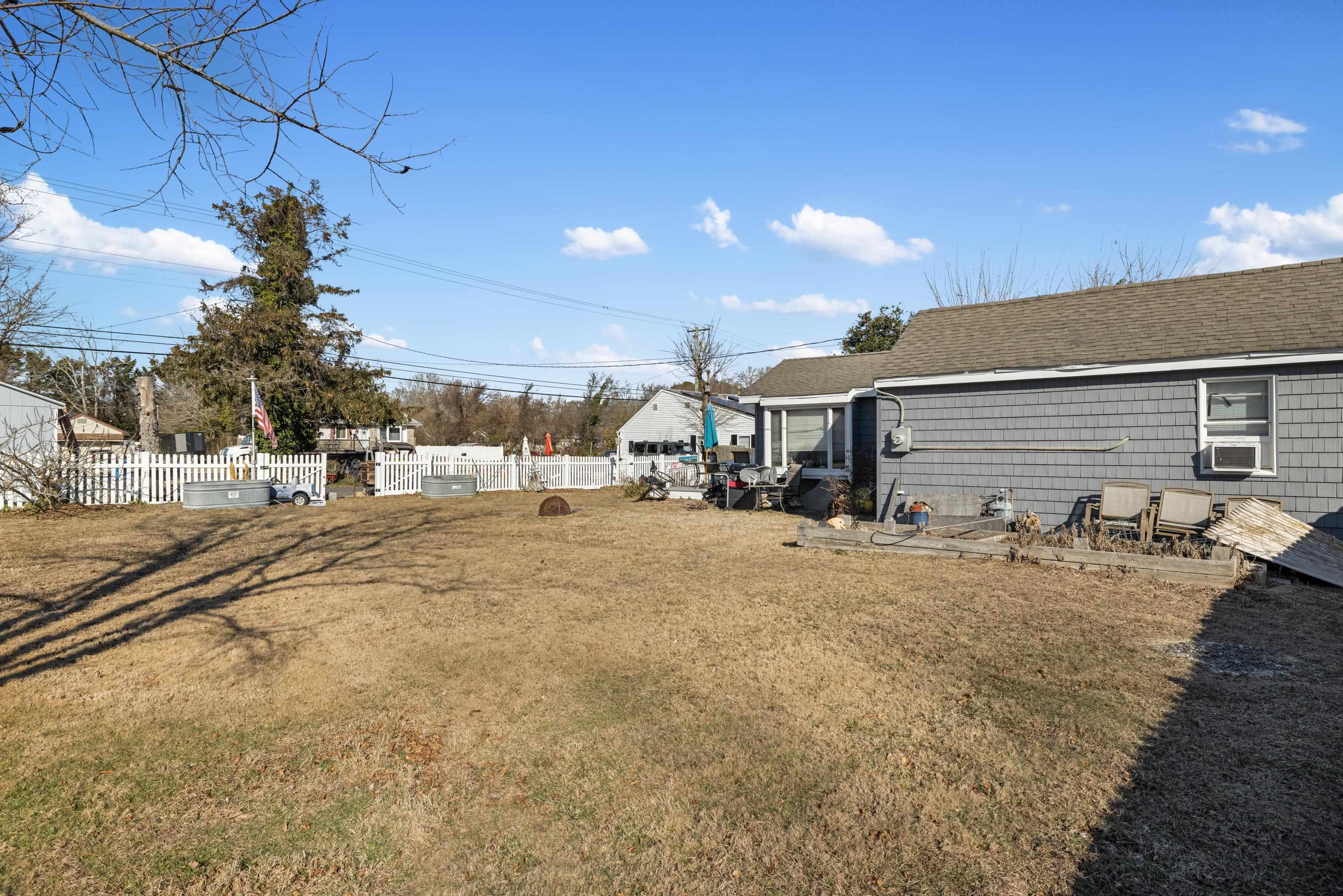 537 Seashore Road Erma, NJ 08204 - Photo 4 of 10 a view of a street with houses