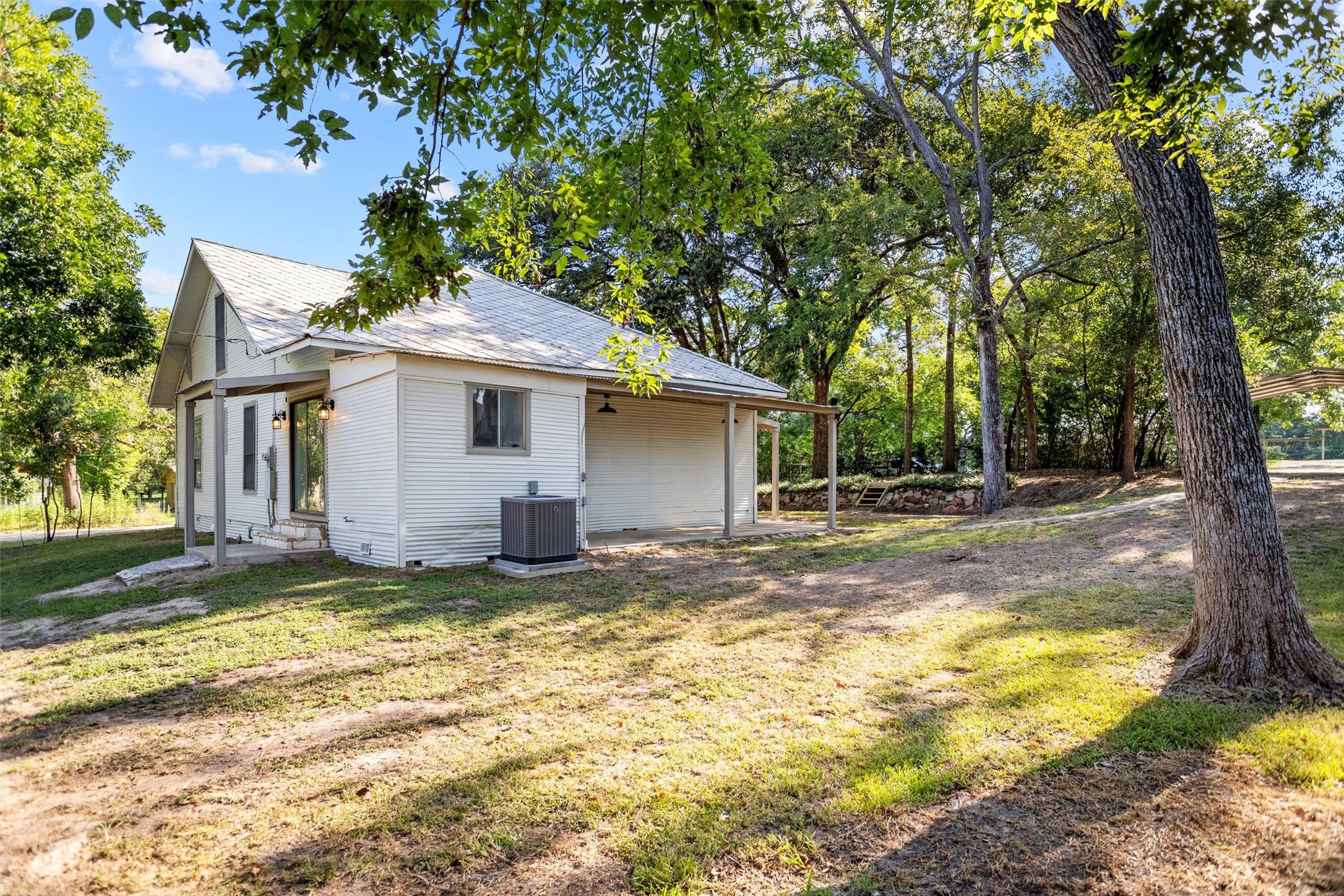 170 Noble Street Lovelady, TX 75851 - Photo 21 of 23 a view of a house with a swimming pool